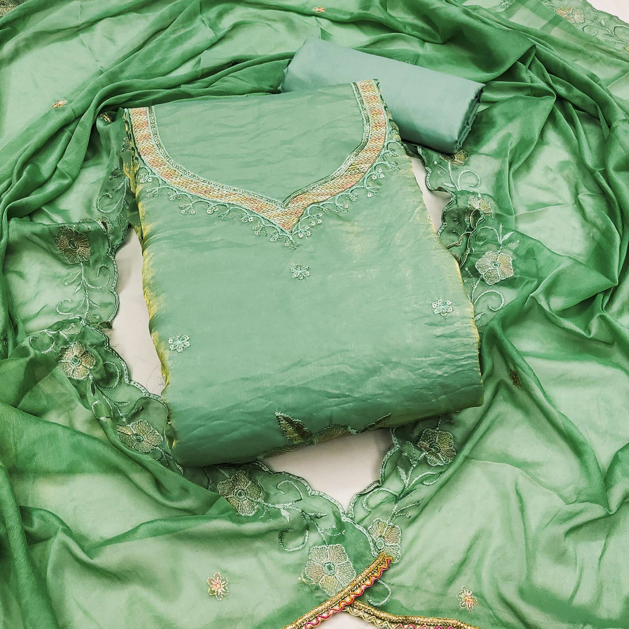 Green Ensemble With Floral Sequins Embroidery Detailing On Satin Viscose Dress Material