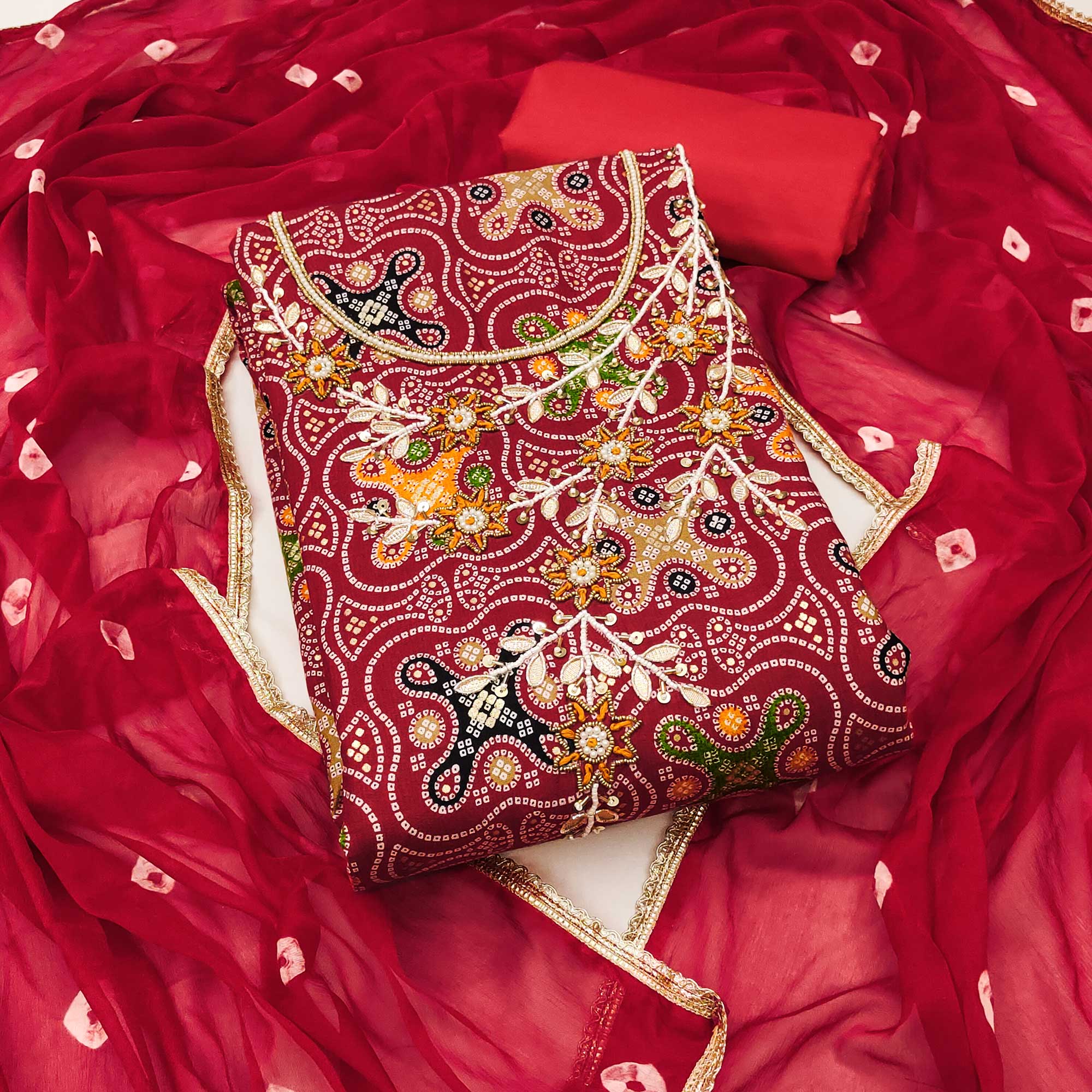 Red Bandhani Printed Pure Cotton Dress Material With Delicate Moti & Gota Patti Handwork