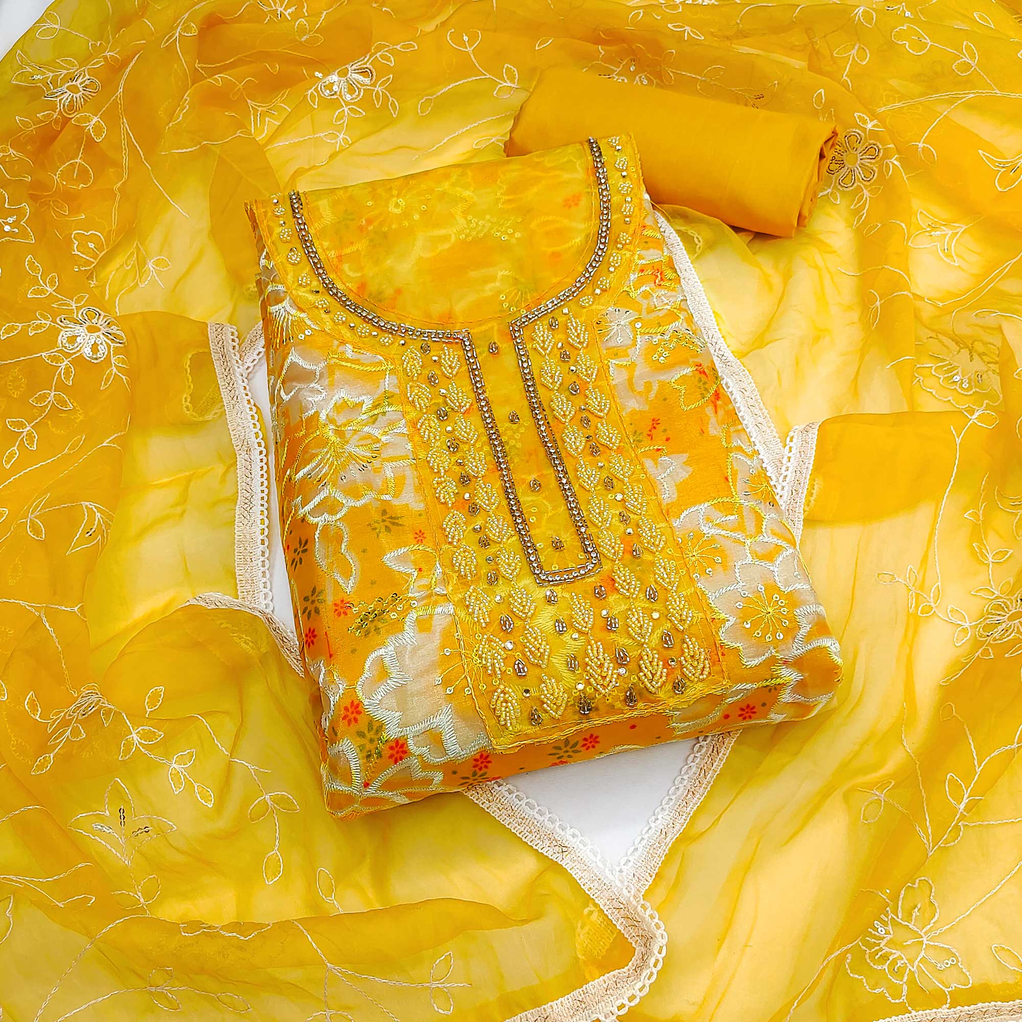 Yellow Delicate Floral Sequins & Hand Embellishments On Flowing Organza Dress Material