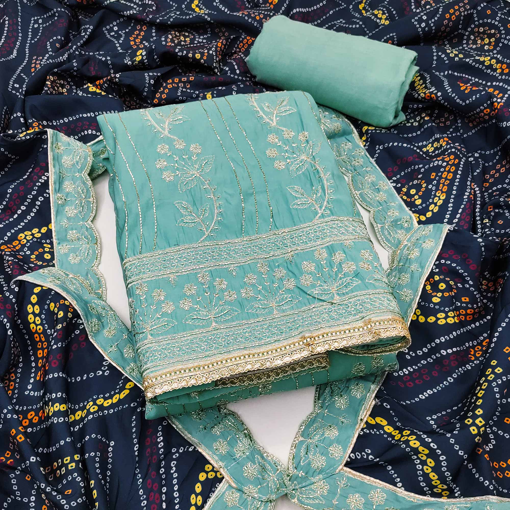 Turquoise Cotton Silk Dress Material Embellished With Elegant Floral Hand Embroidery Work