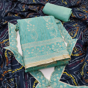 Turquoise Cotton Silk Dress Material Embellished With Elegant Floral Hand Embroidery Work