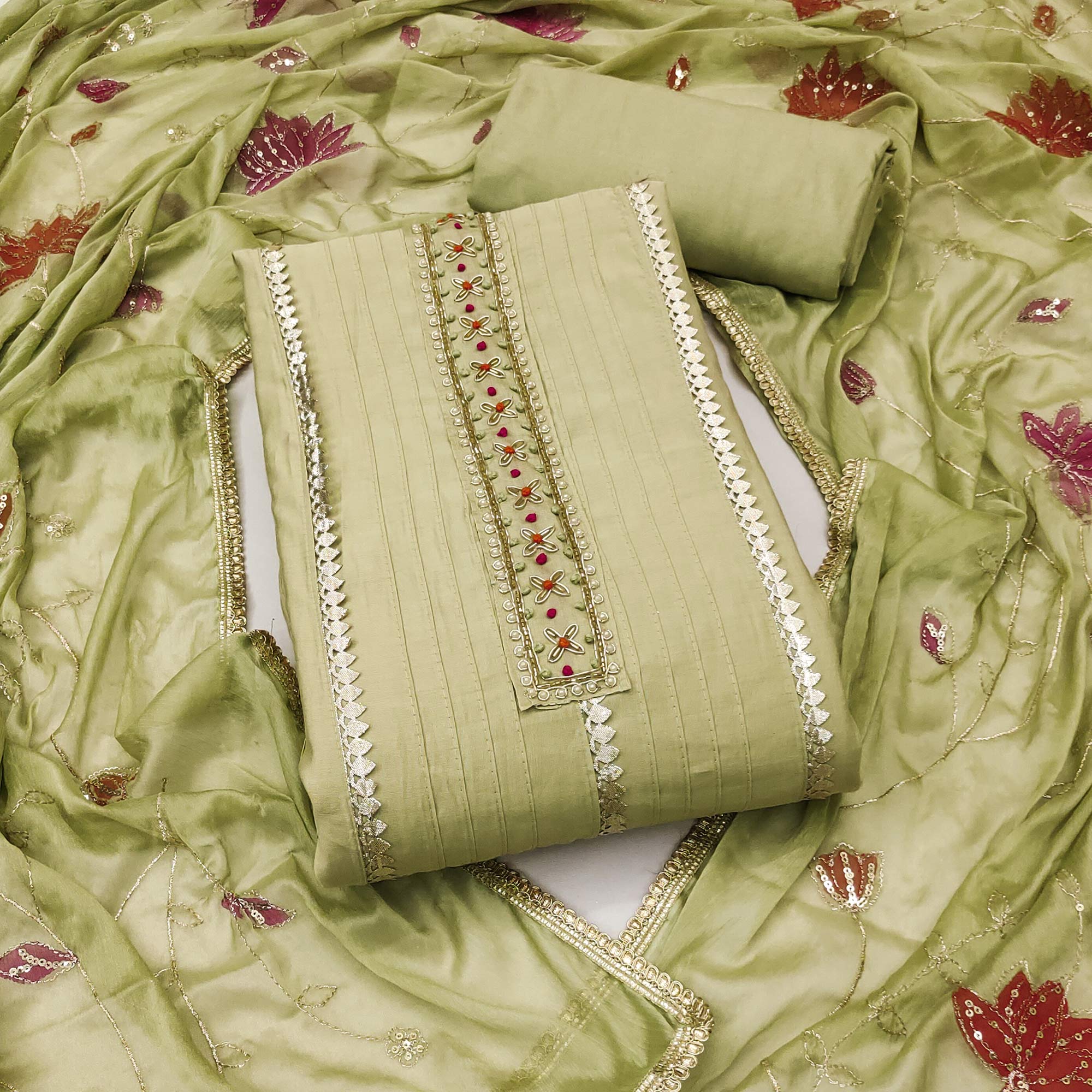 Green Cotton Silk Dress Material Embellished With Elegant Moti Handwork & Delicate Gota Patti Lace