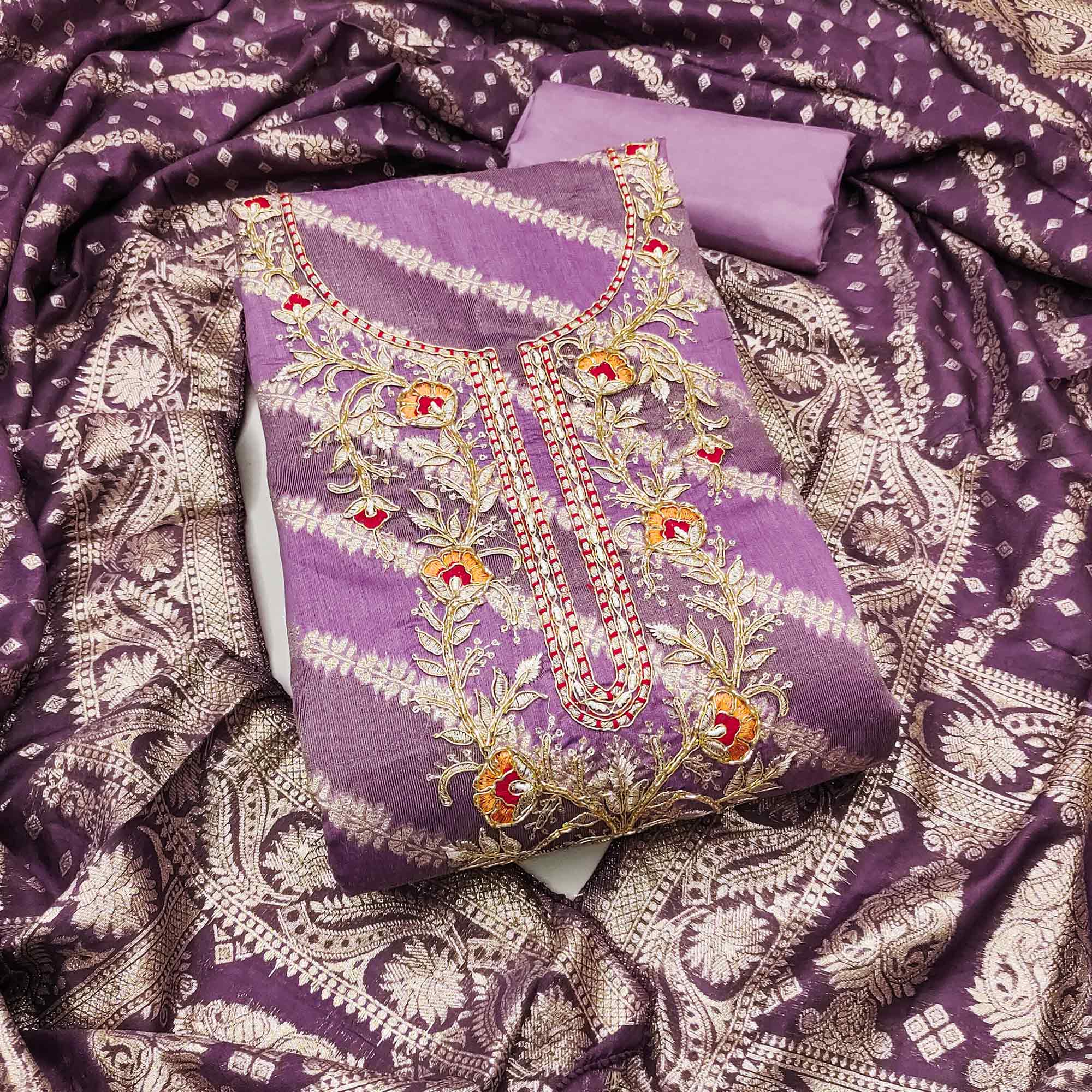 Purple Shimmer Cotton Silk Suit Material Featuring Zari Weaving and Artistic Embroidered Detailing