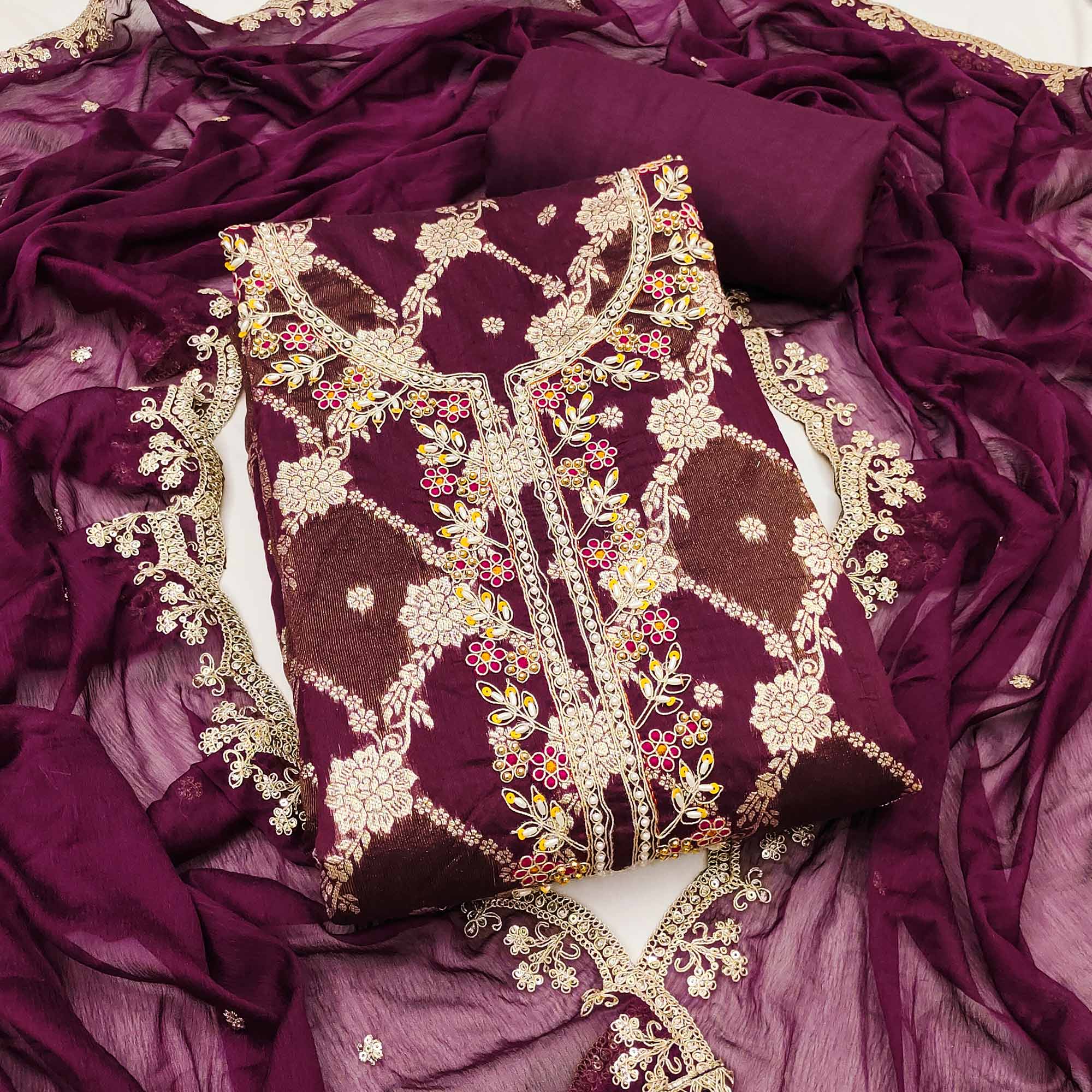 Opulent Wine Floral Woven Banarasi Silk Dress Material With Detailed Handwork & Sequin Embroidery