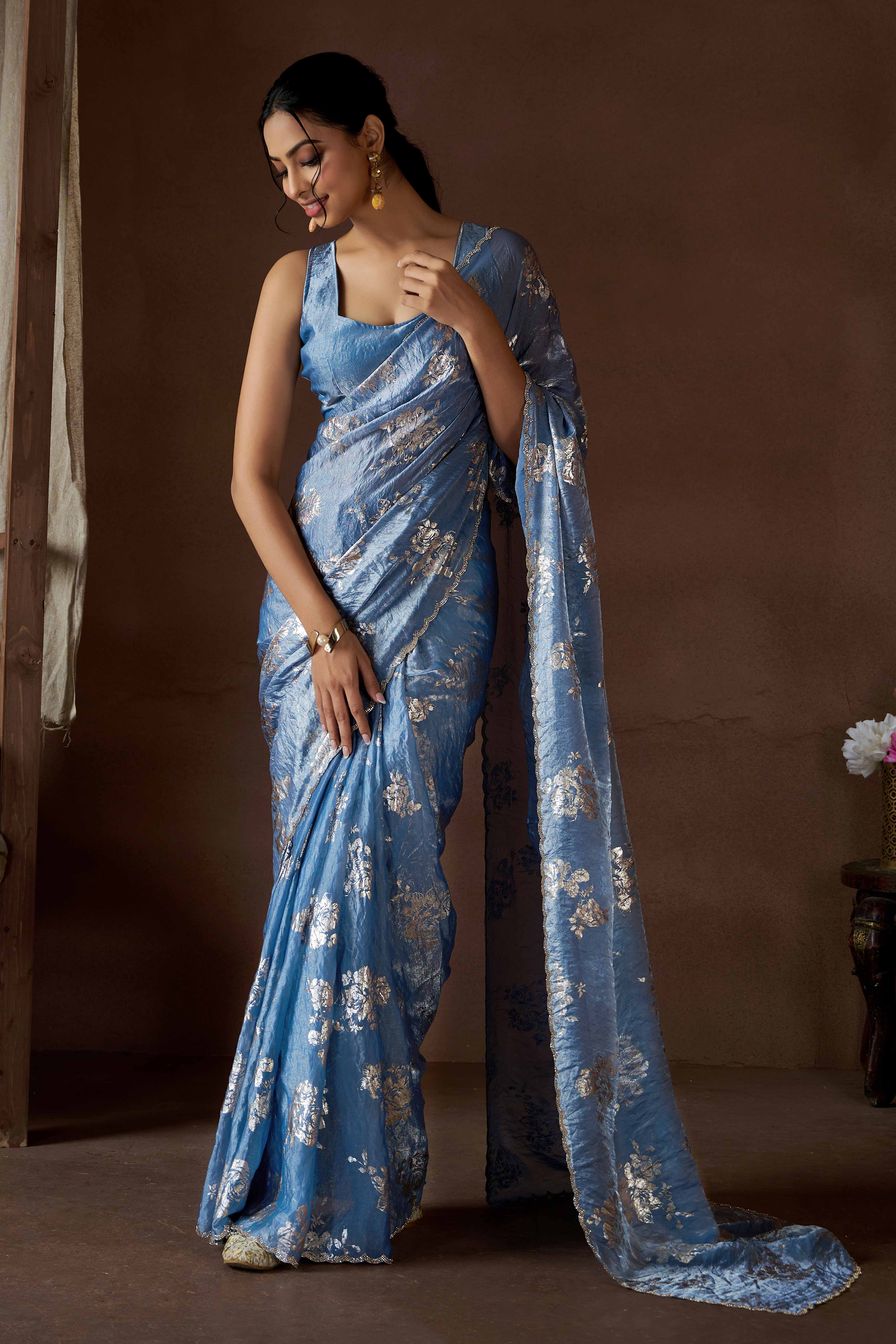 Blue Floral Foil Printed Satin Silk Saree With Zarkan Border