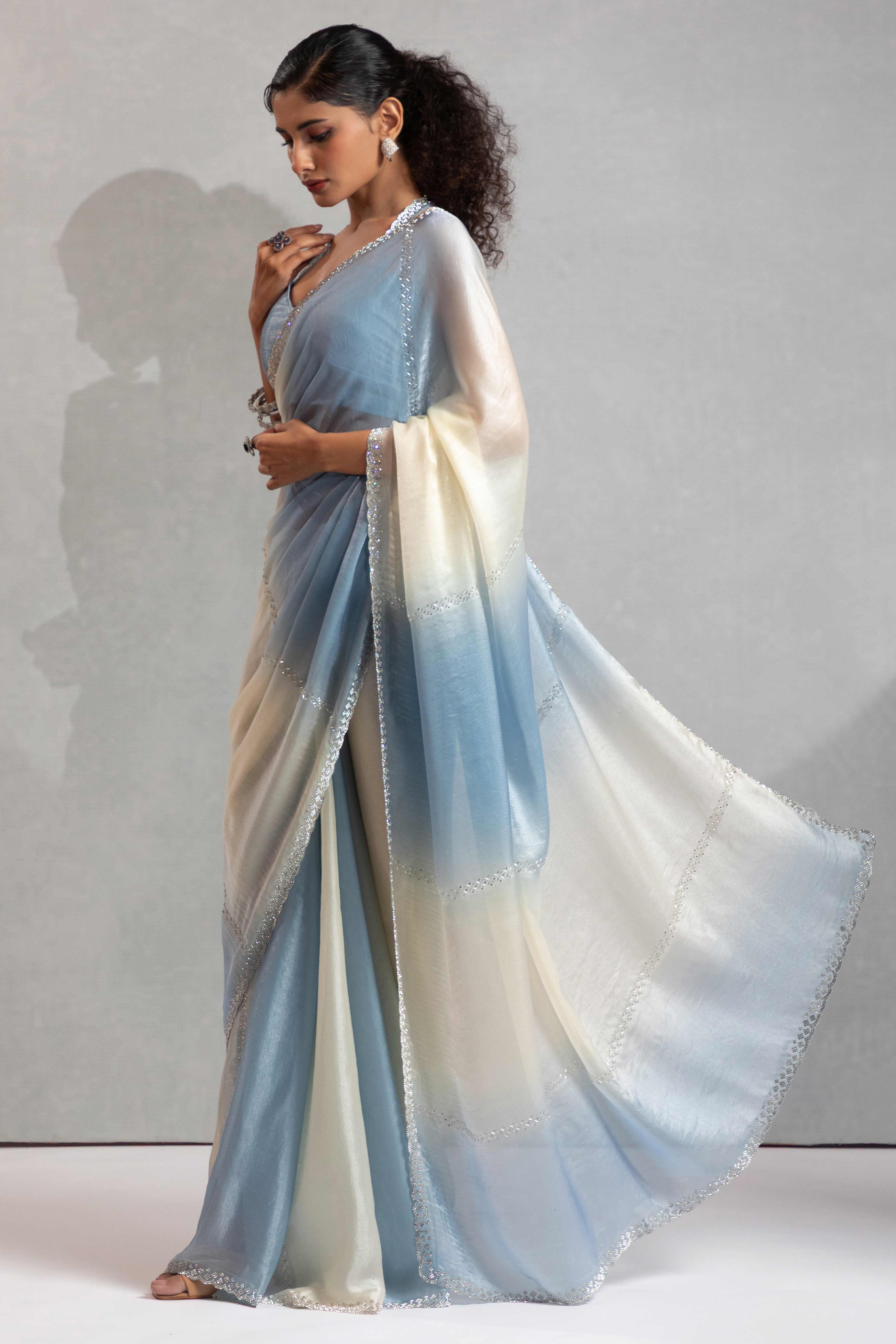 Blue & Off White Satin Silk Saree Decorated With Stone Embellishments