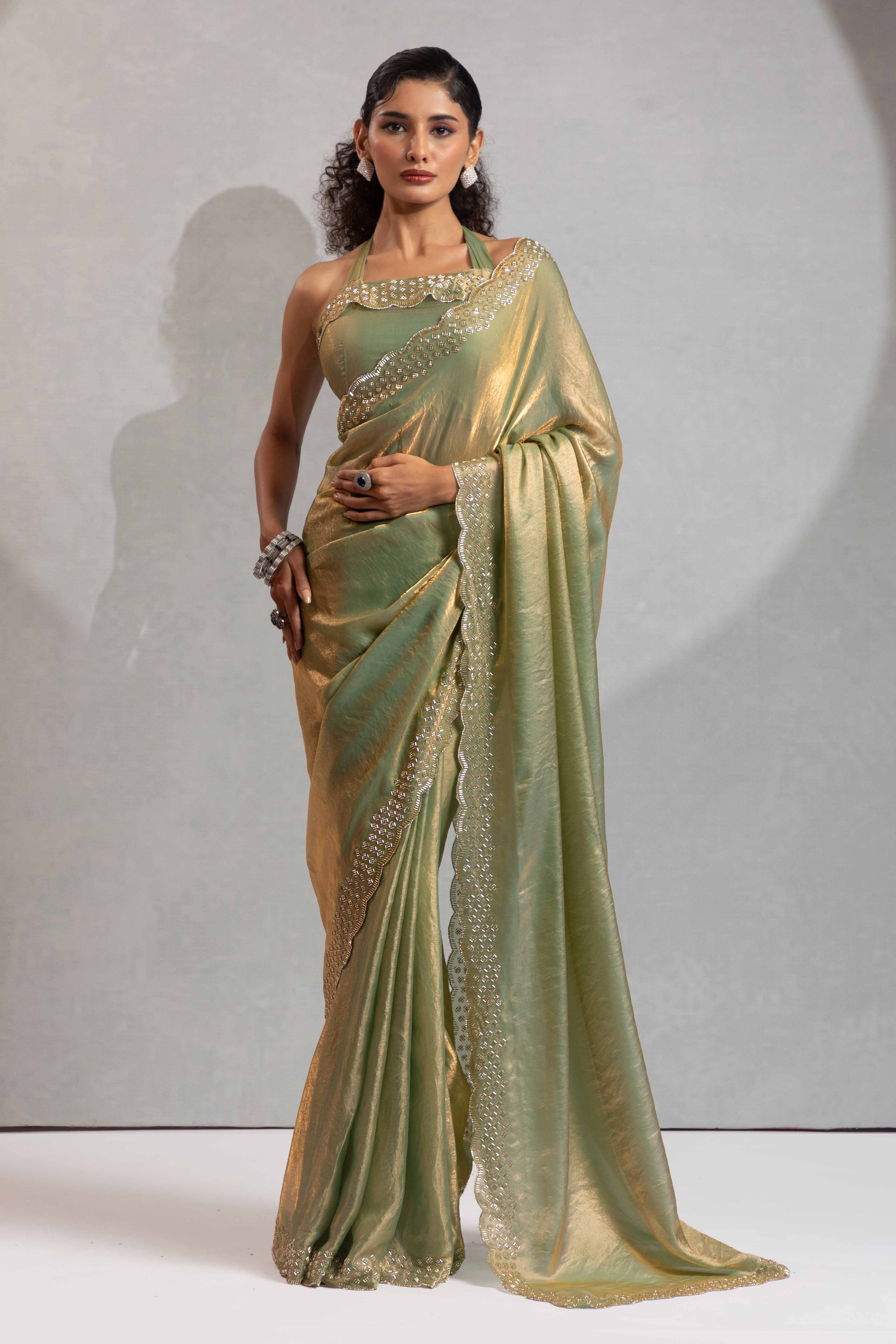 Pista Green Satin Saree with Glamorous Stone Embellishment