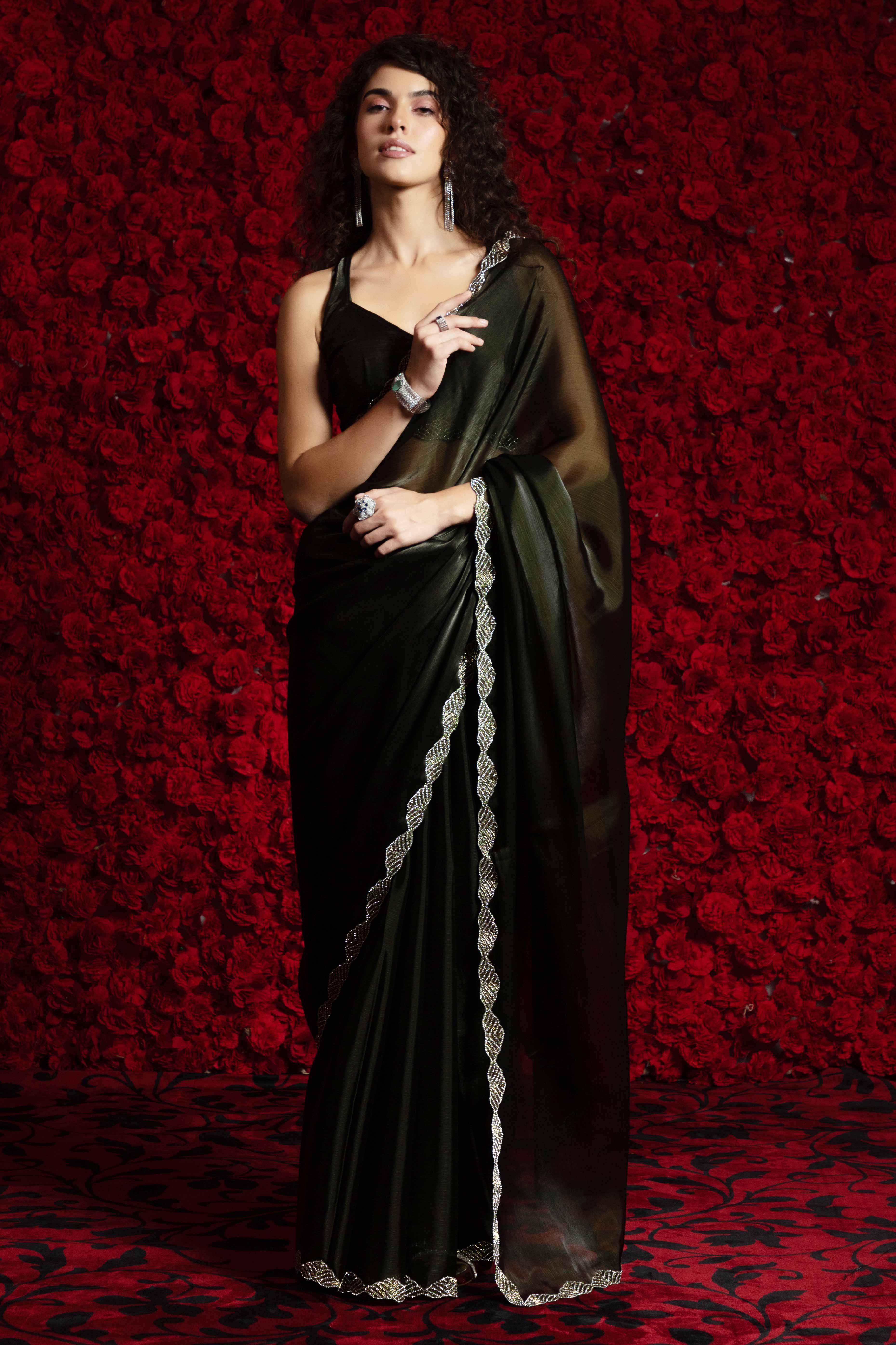 Deep Olive Solid Tissue Chiffon Saree Accentuated With A Sparkling Zarkan Work Border