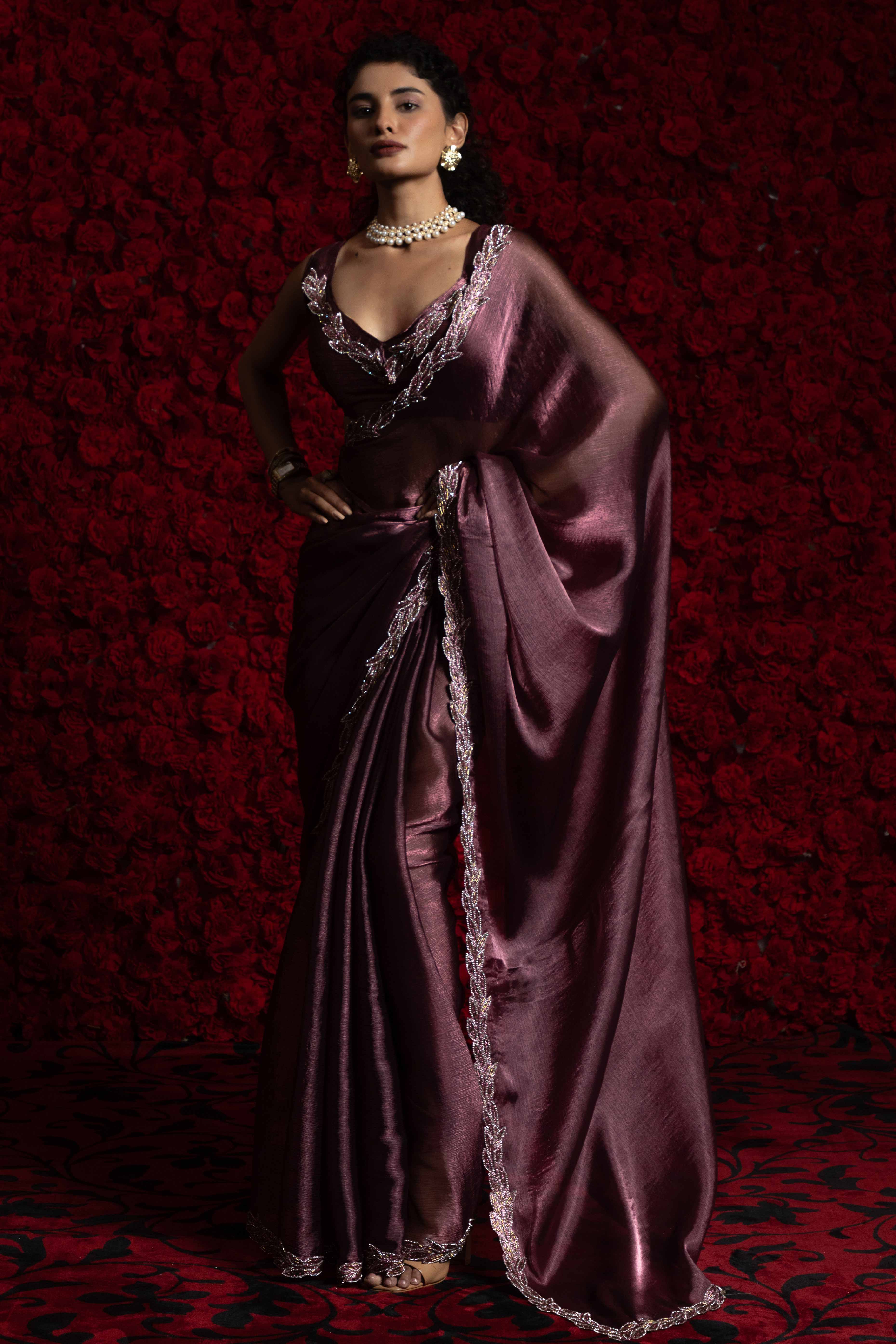 Deep Mauve Solid Tissue Chiffon Saree Accented With Elegant Zarkan Work Border