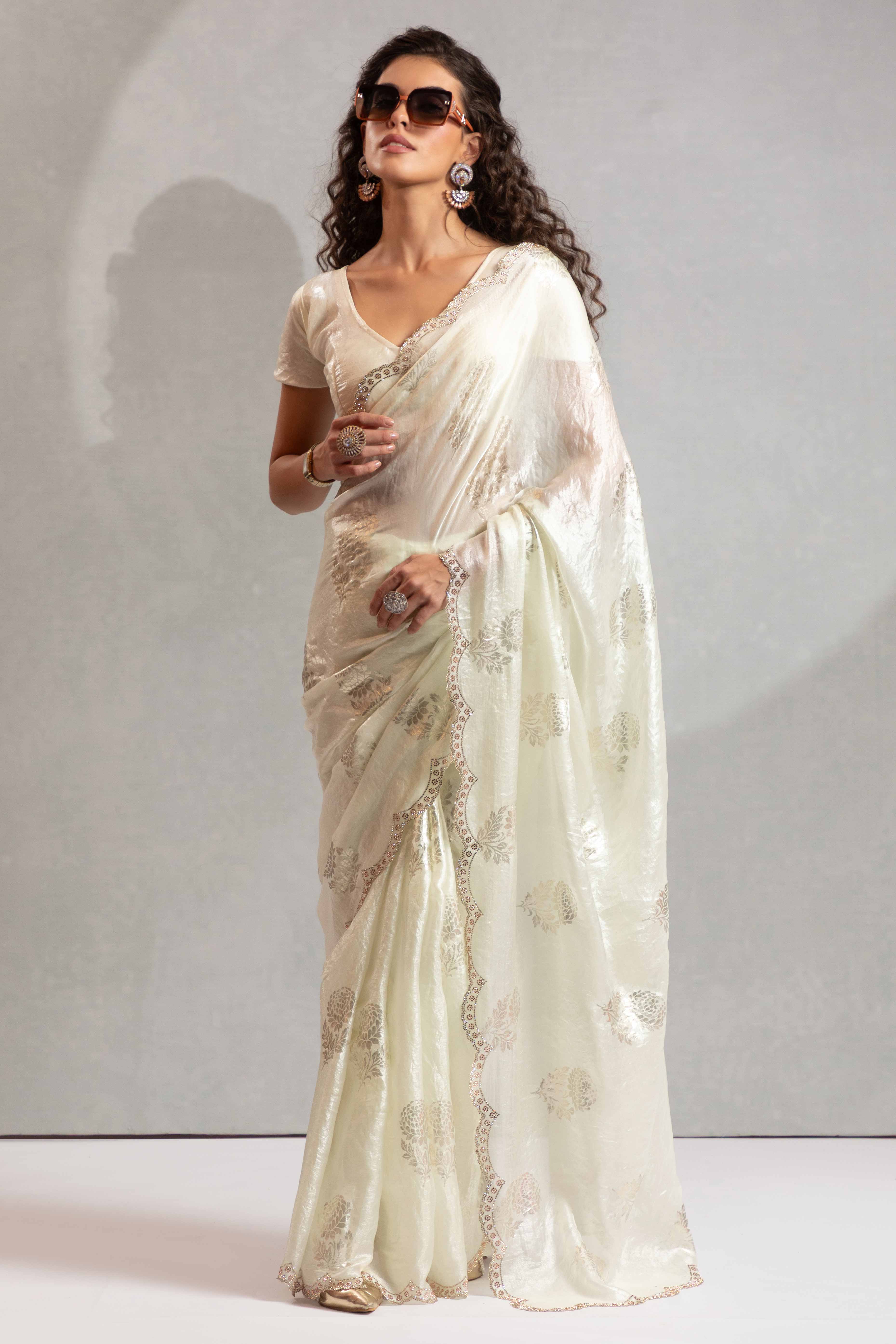 Offwhite Satin Silk Saree Showcasing Elegant Floral Foil Prints & Dazzling Zarkan Work