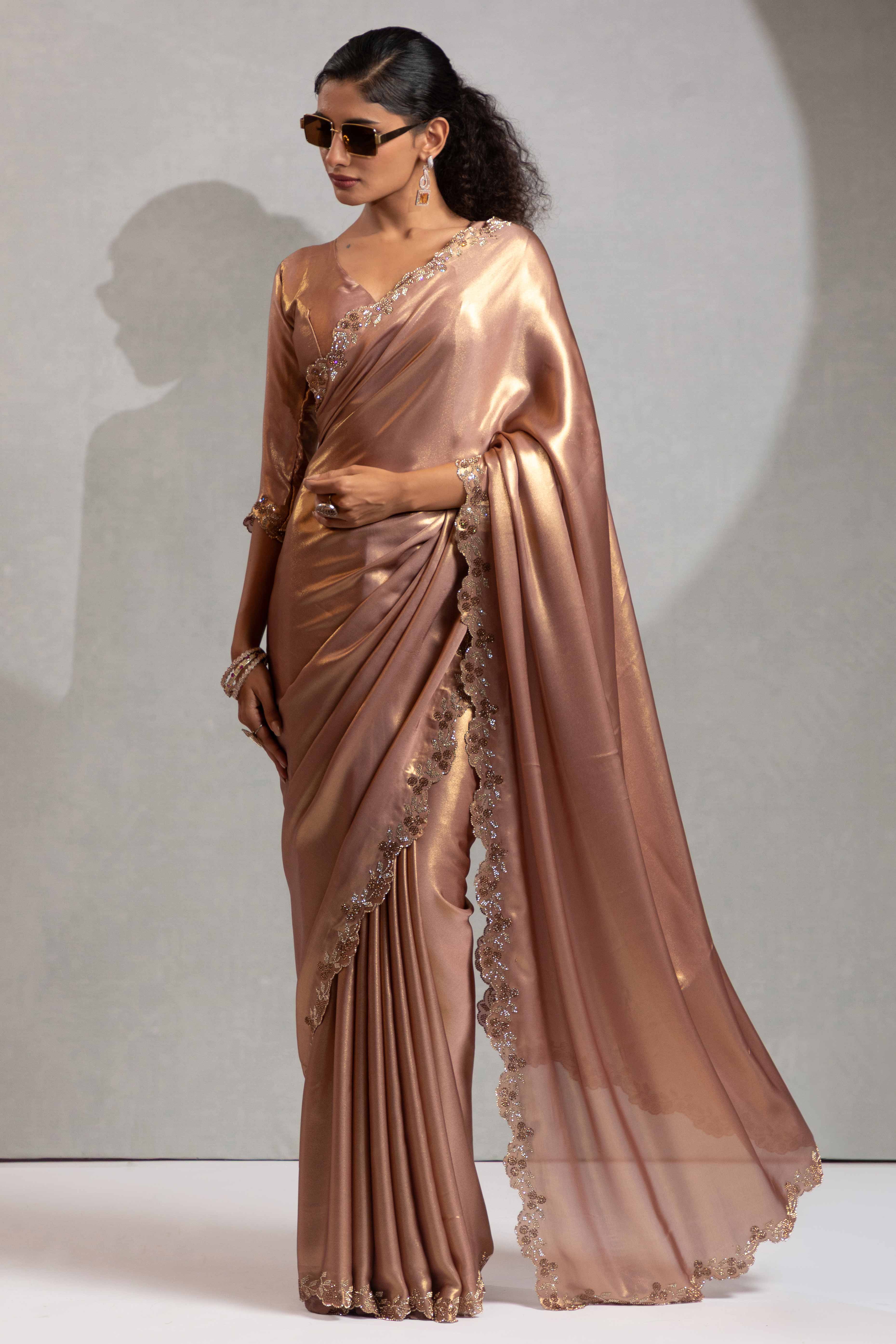 Zircon Brown Satin Georgette Saree Adorned With Subtle Foil Finish & A Sparkling Zarkan Work Border