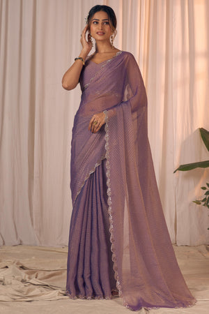Designer Lavender Georgette Saree Adorned With An Elegant Zarkan Cutwork Border