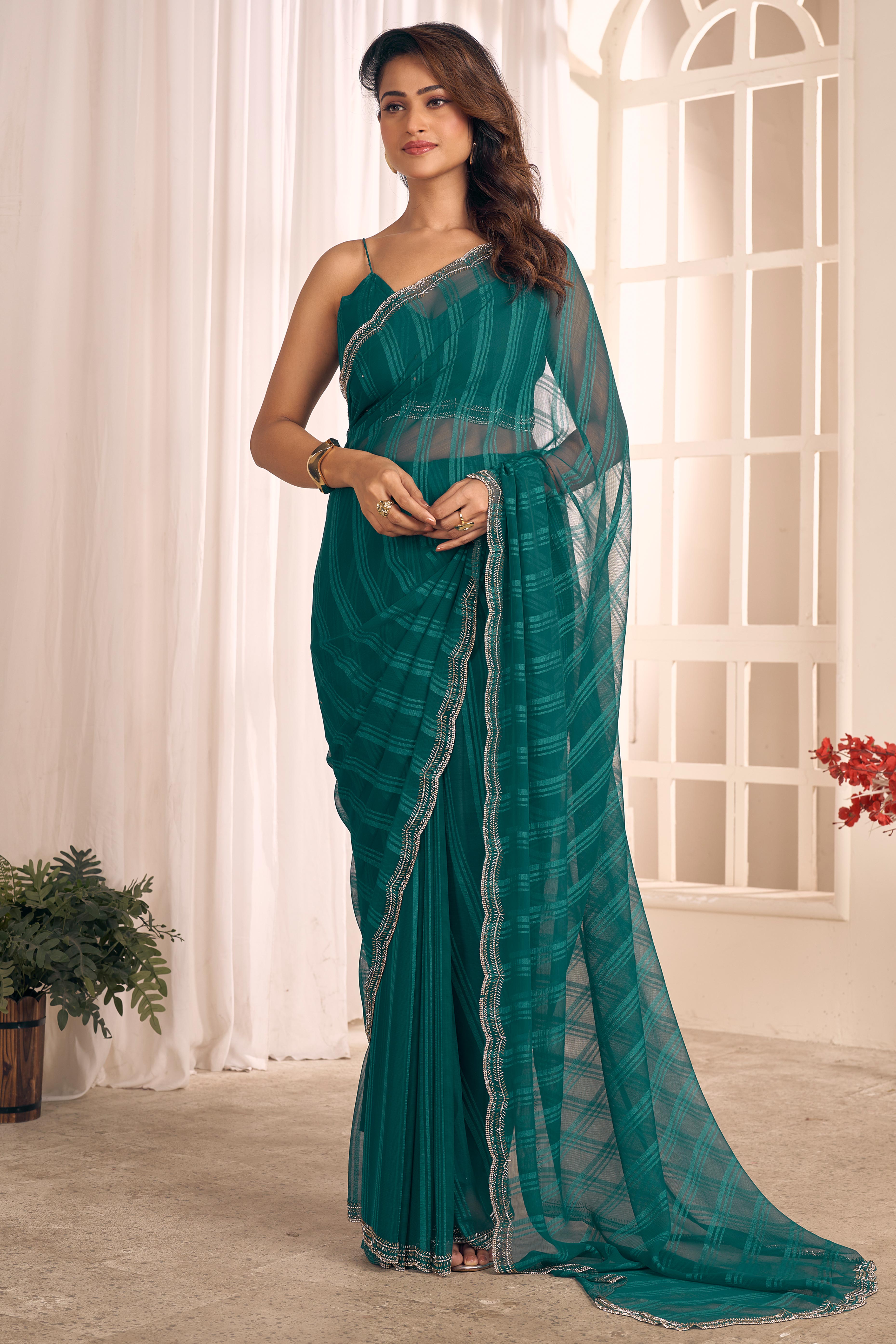 Teal Georgette Saree Featuring Contemporary Stripes With A Sparkling Diamond & Beads Work Border