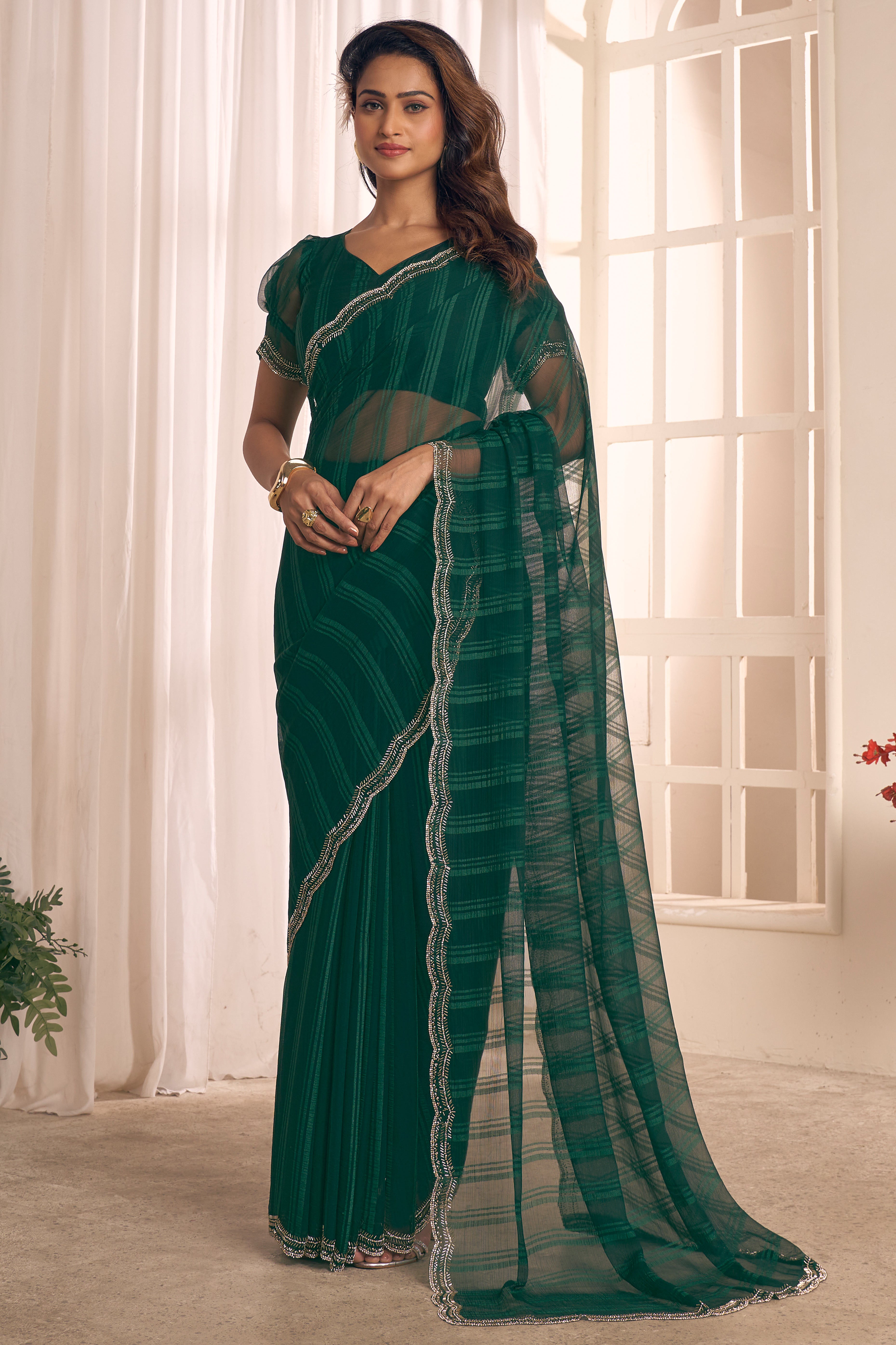 Green Georgette Saree Featuring Contemporary Stripes With A Sparkling Diamond & Beads Work Border