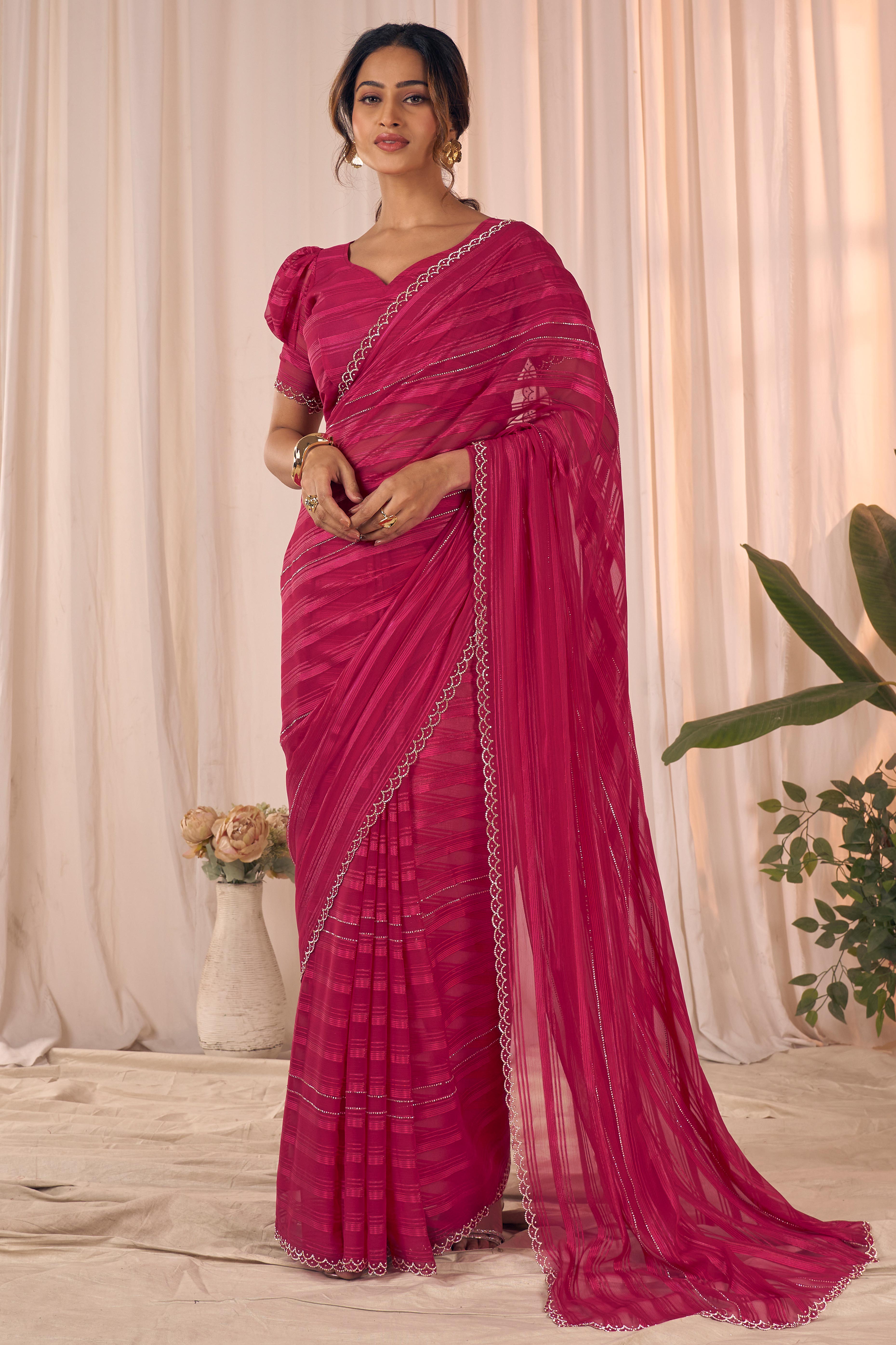 Rose pink Striped Designer Georgette Saree Adorned With An Elegant Zarkan Cutwork Border
