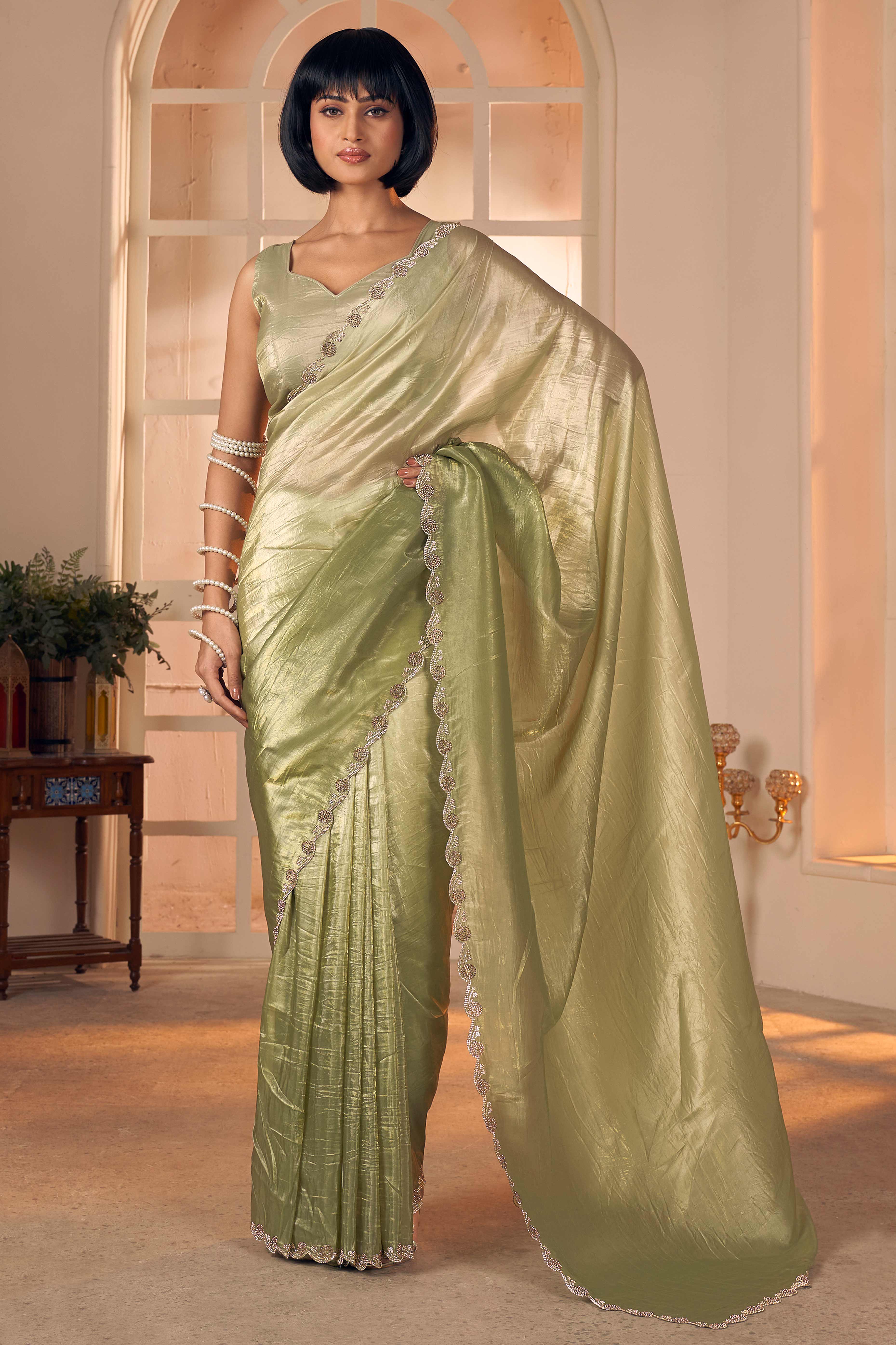 Elegant Olive Pure Silk Saree Enhanced With Premium Zarkan Cutwork Embellishment