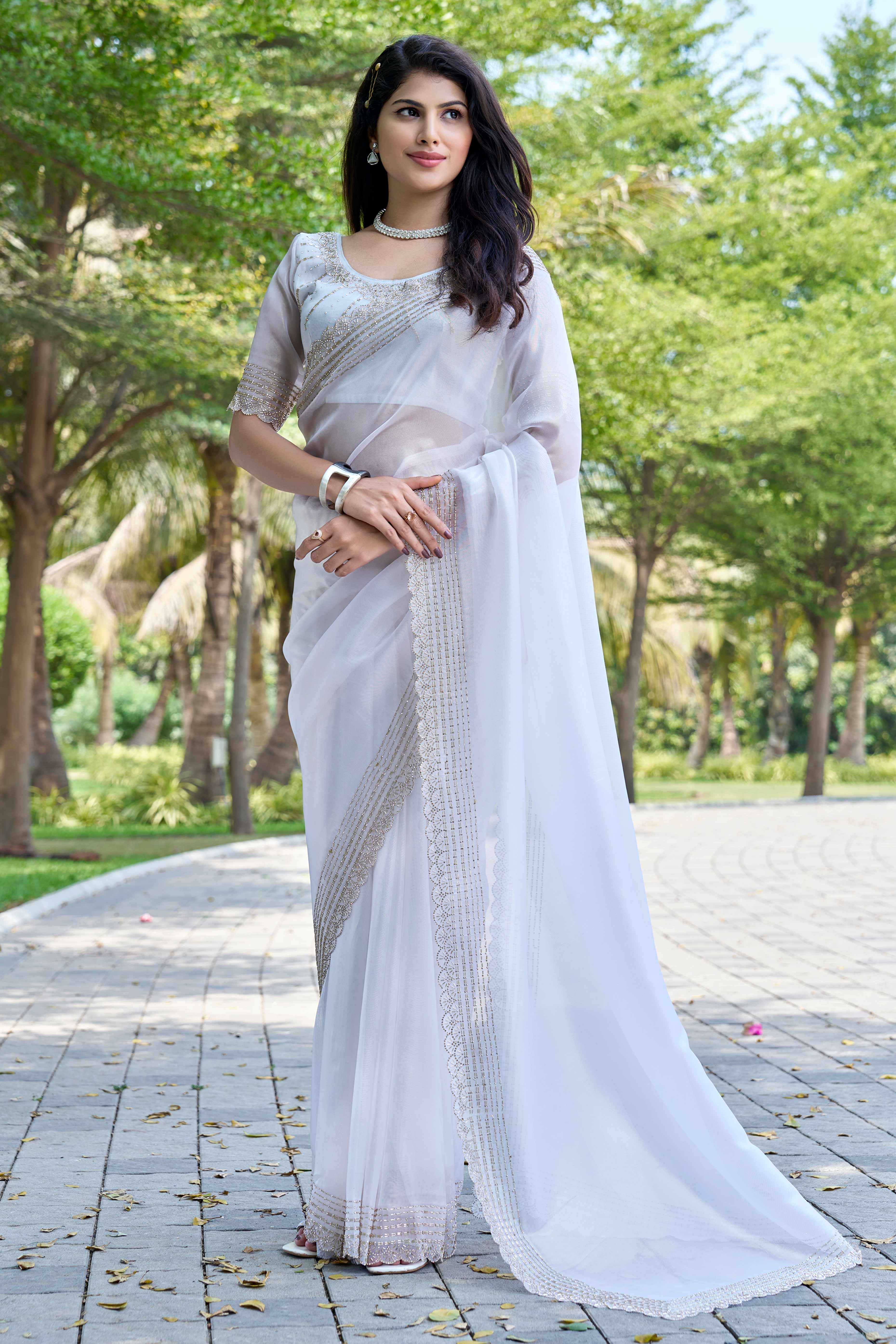 White Soft Organza Saree with Stone Embellishments Work