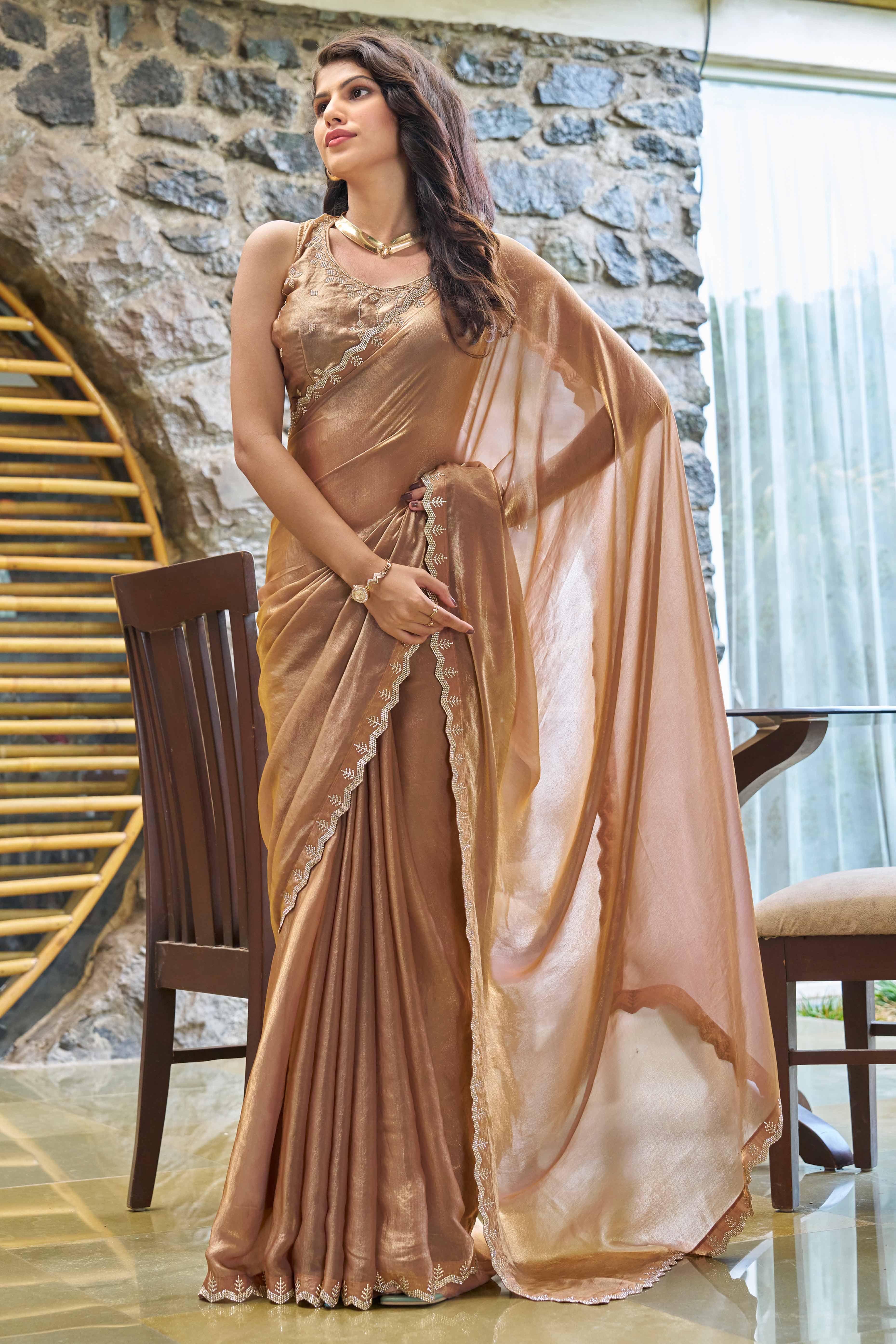 Graceful Emerald  Brown Georgette Solid Saree With Luxurious Handwork