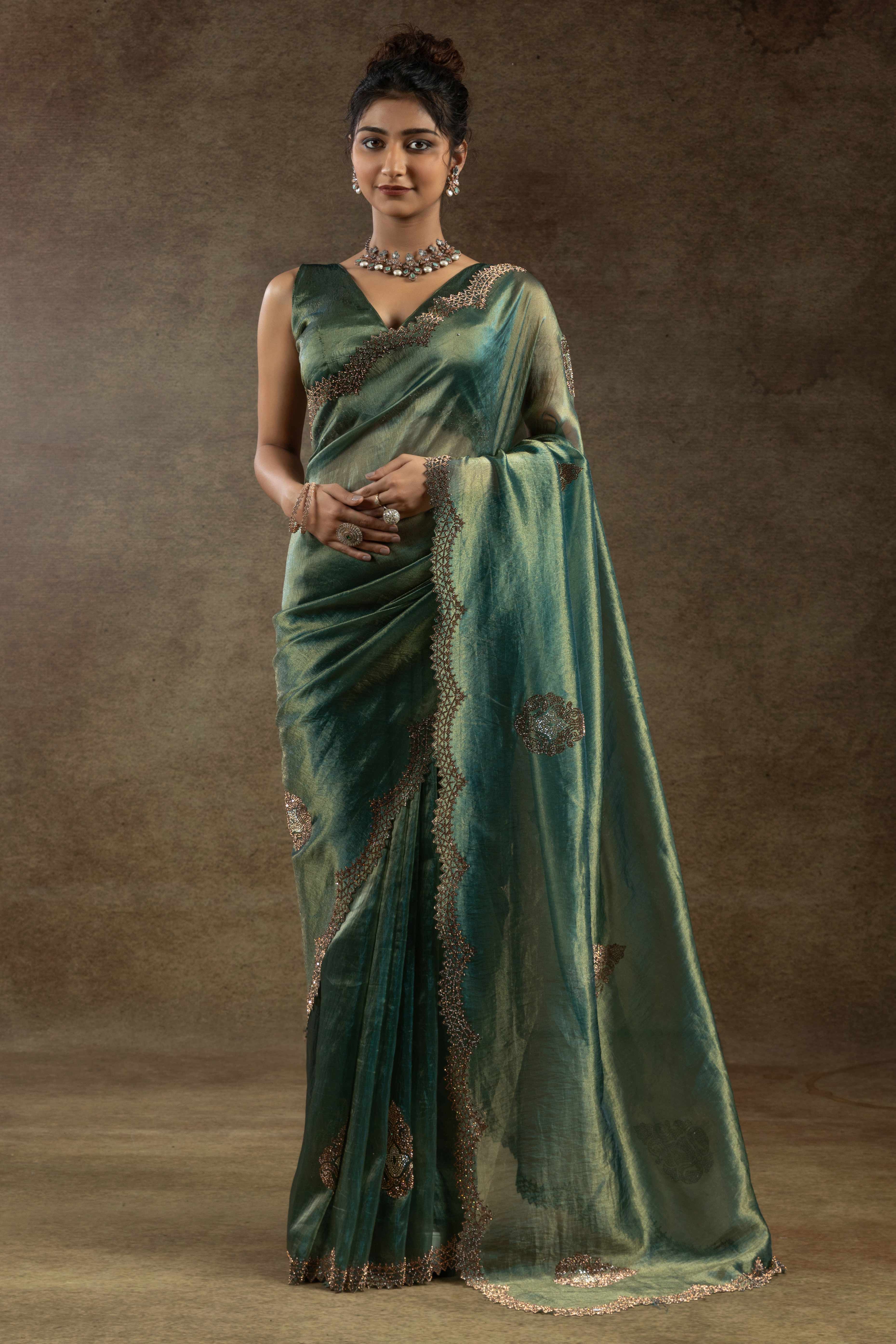 Green Banarasi Silk Saree with Stone Embellishments Perfect for Party Wear