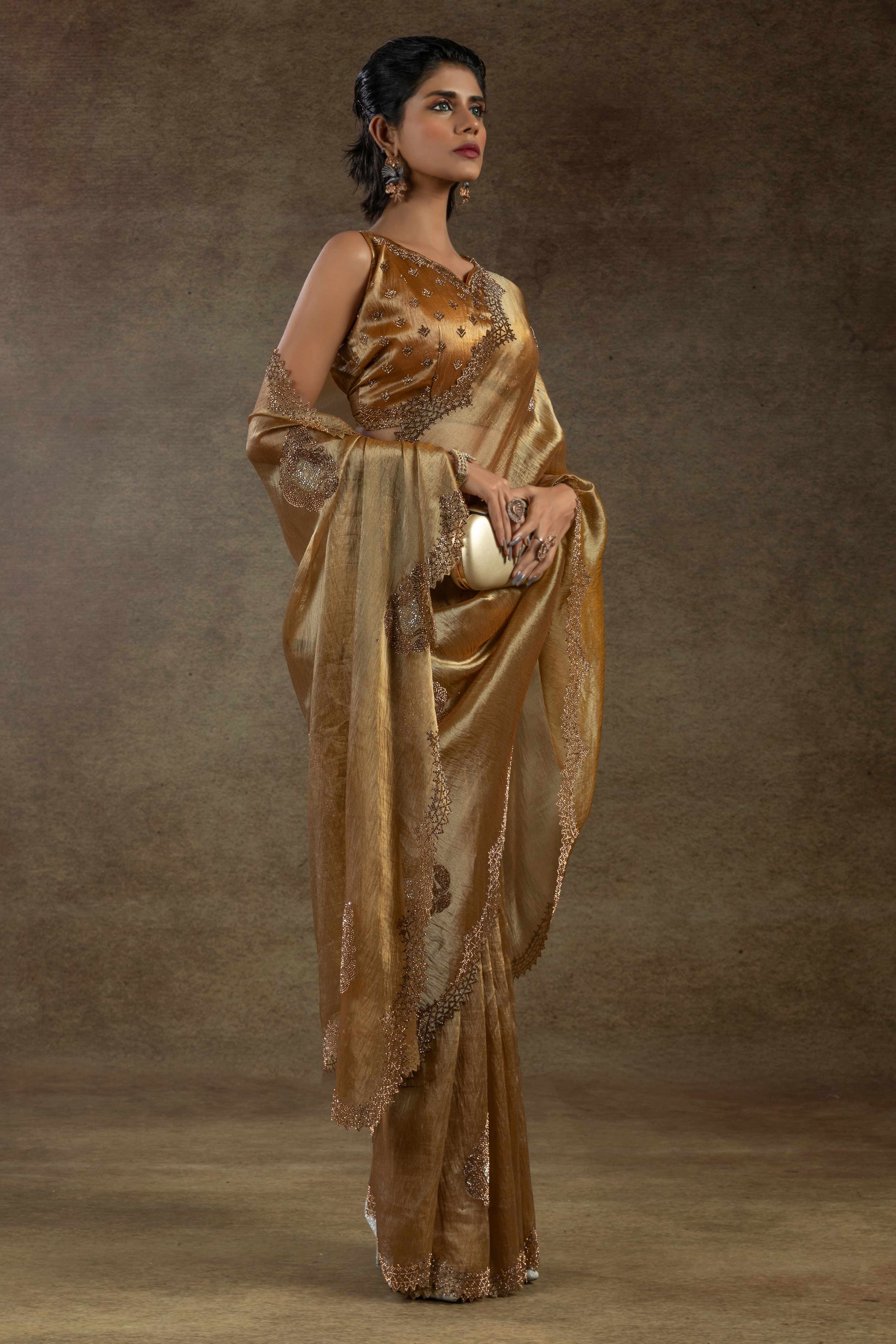 Gold Banarasi Silk Saree with Stone Embellishments Perfect for Party Wear