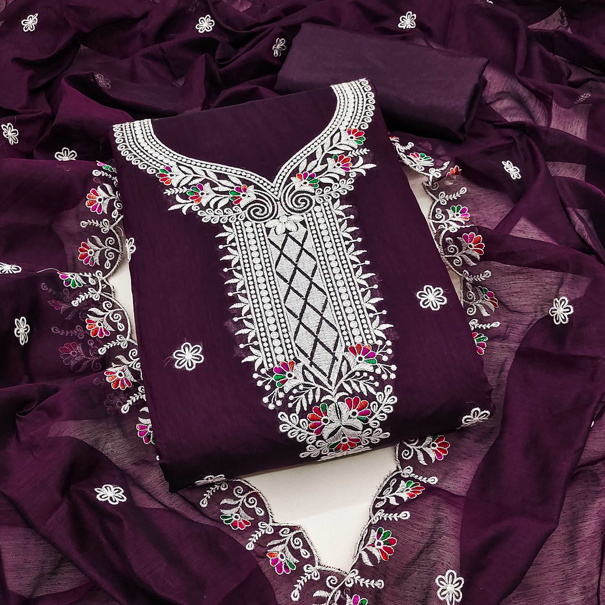 Wine Cambric Cotton Dress Material With Elegant Floral Embroidery Work