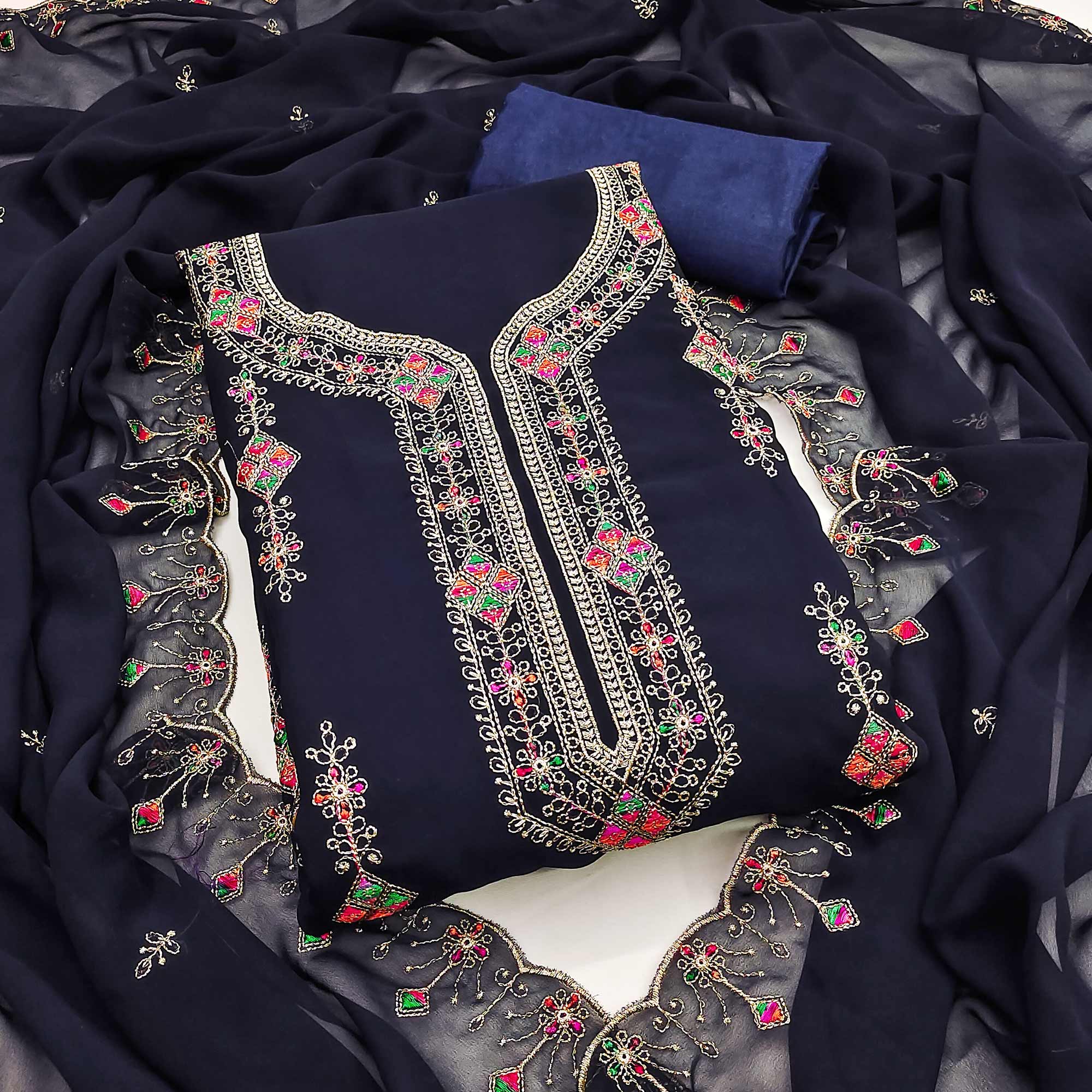 Blue Georgette Dress Material Enhanced With Graceful Floral Embroidery For An Elegant Ethnic Look