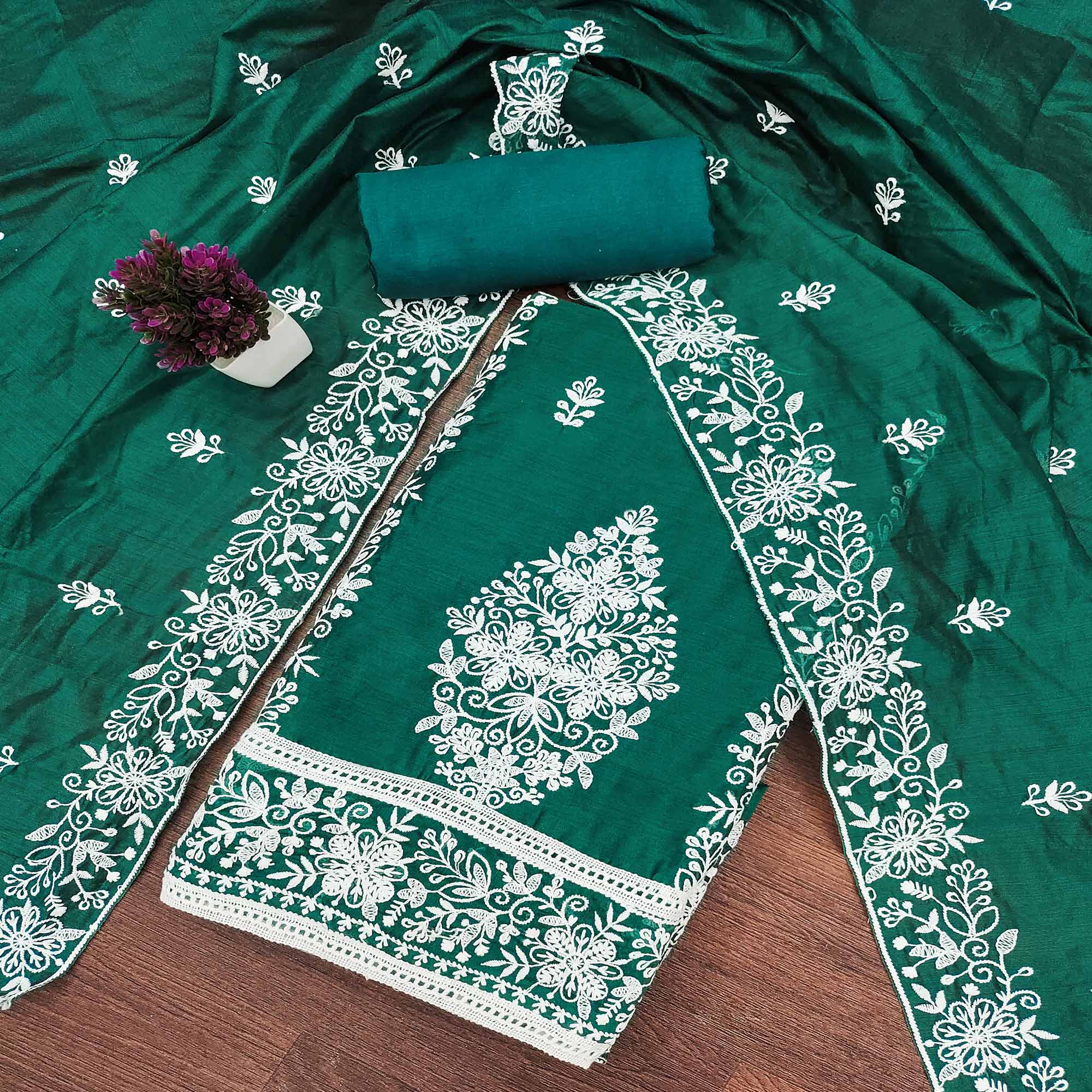 Green Chanderi Cotton Dress Material With Graceful Floral Thread Embroidery