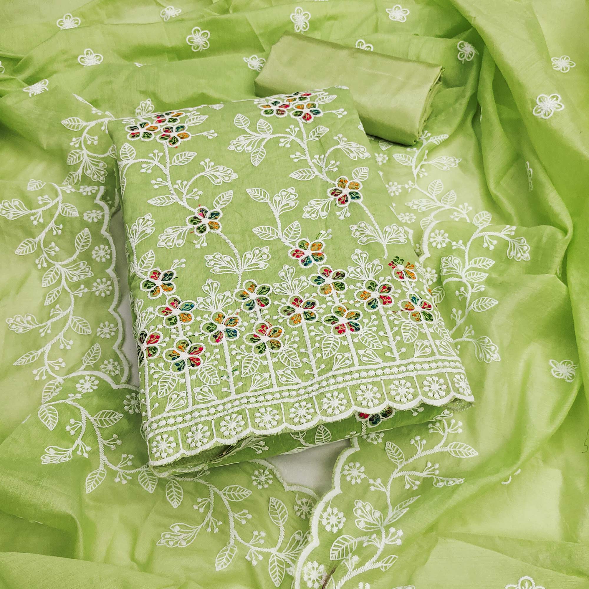 Light Green Chanderi Cotton Dress Material Adorned With Elegant Floral Thread Embroidery Work