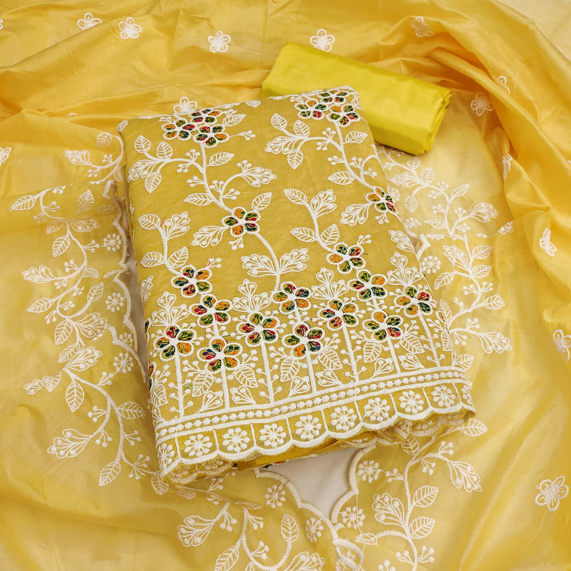 Yellow Chanderi Cotton Dress Material Adorned With Elegant Floral Thread Embroidery Work