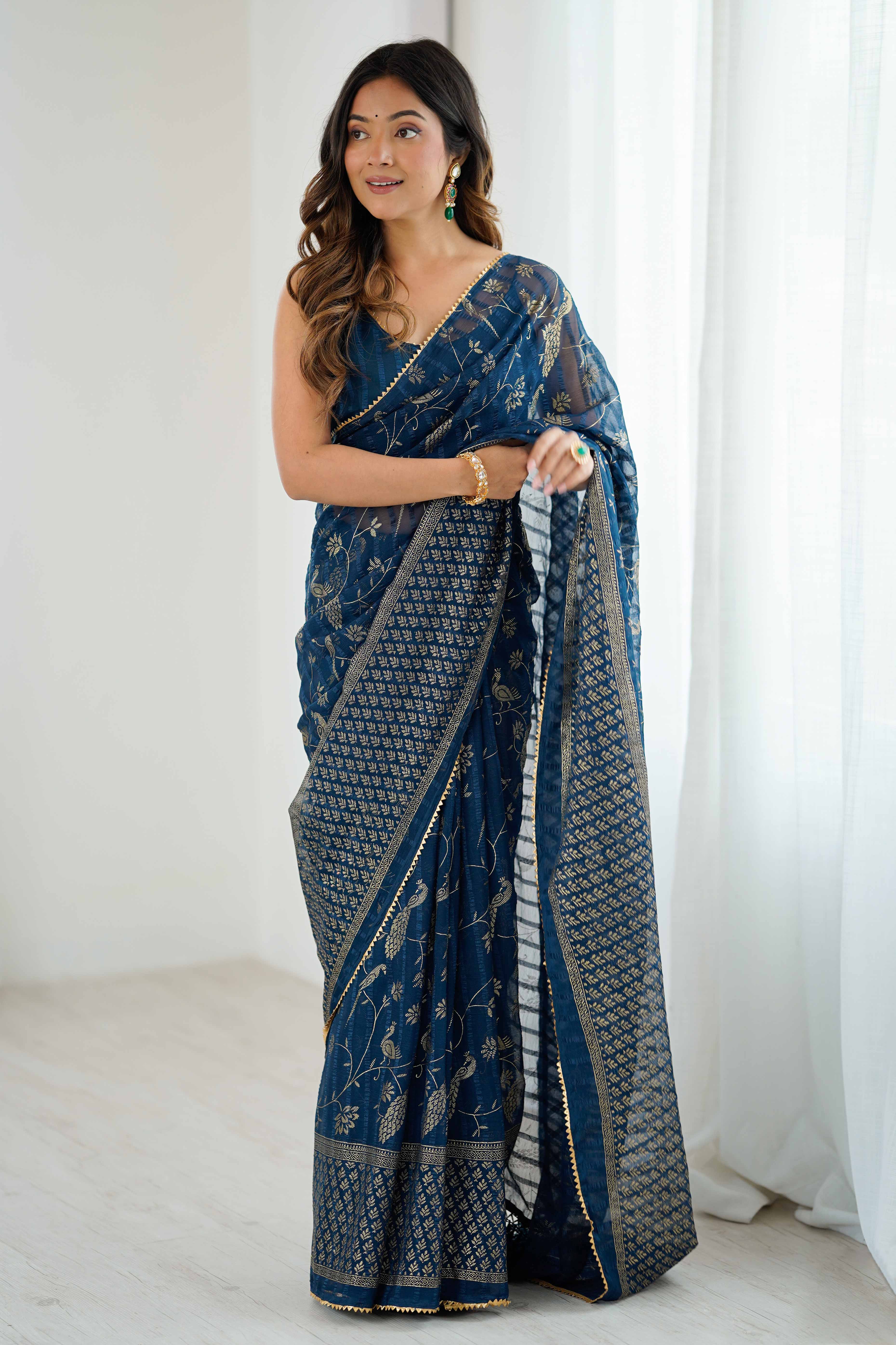 Morpich Blue Georgette Saree with Shimmering Foil Print & Gota Patti Border