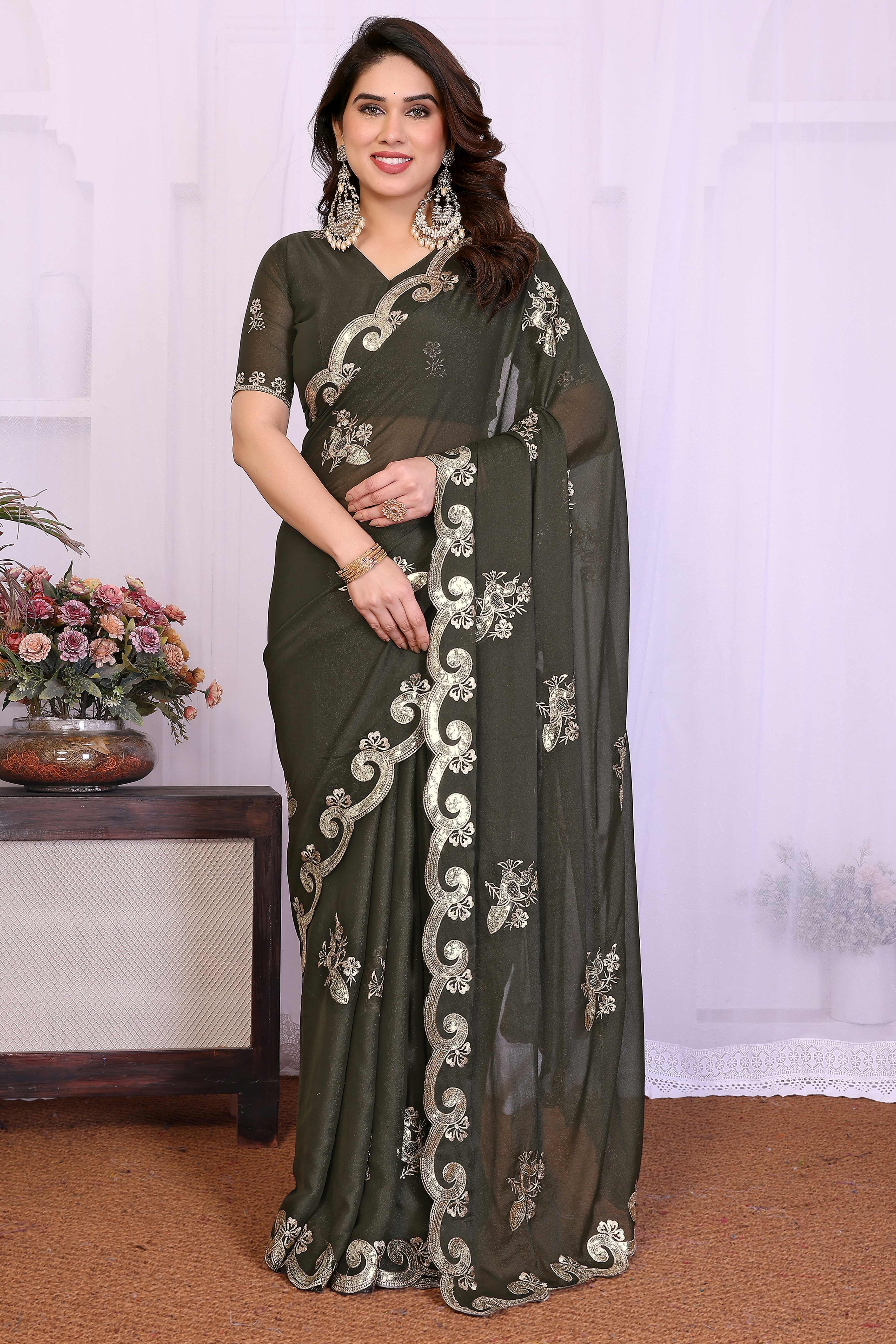 Charming Mehendi Green Floral & Peacock Motif Georgette Saree Enhanced With Sequins Embroidery