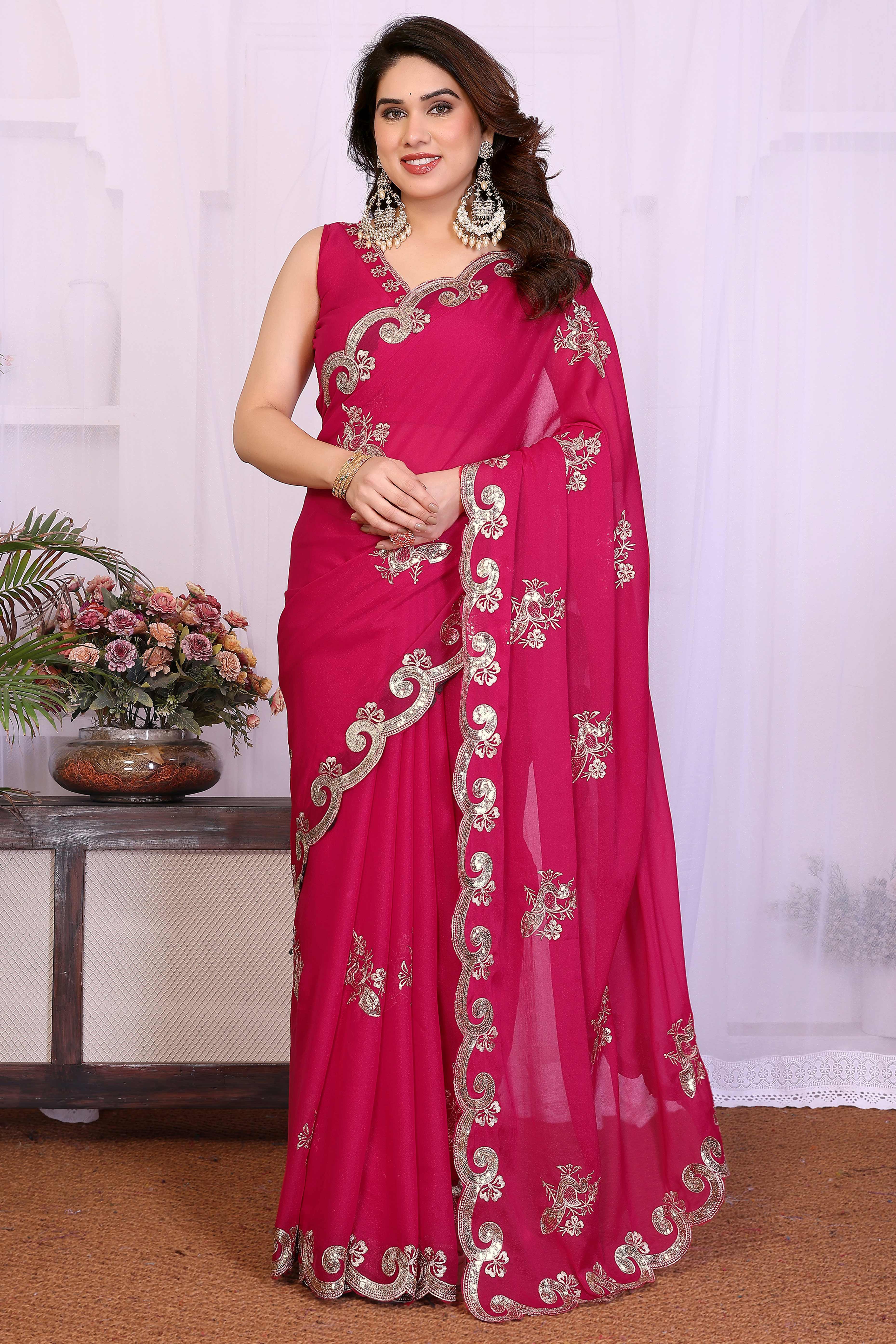 Charming Pink Floral & Peacock Motif Georgette Saree Enhanced With Sequins Embroidery
