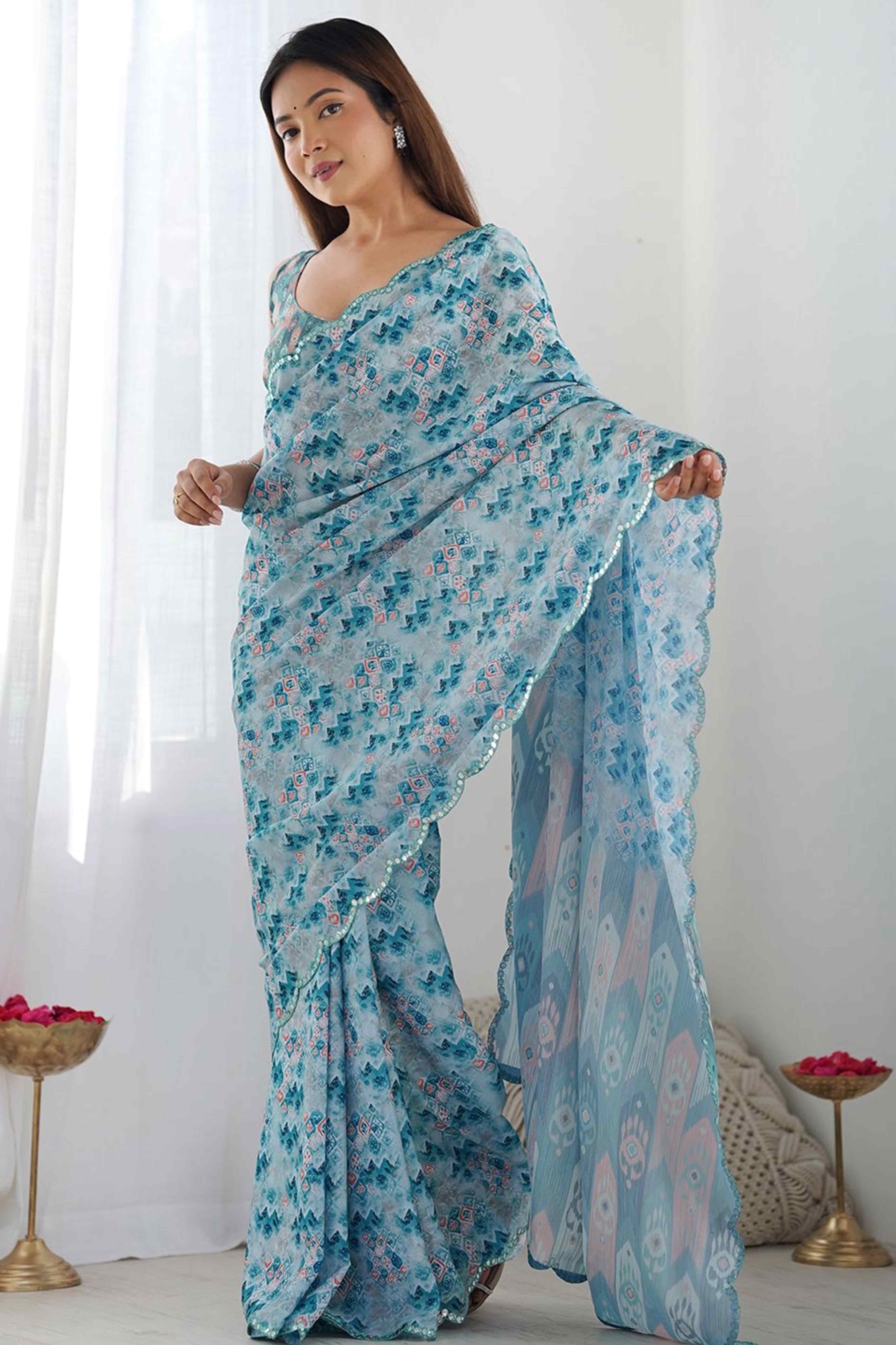 Light Blue Geometric Digital Print Georgette Saree Enhanced With A Sparkling Lace Border