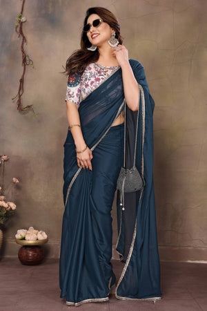 Morpich Blue Solid Sparkling Georgette Saree Enhanced With Shimmering Mirror Border