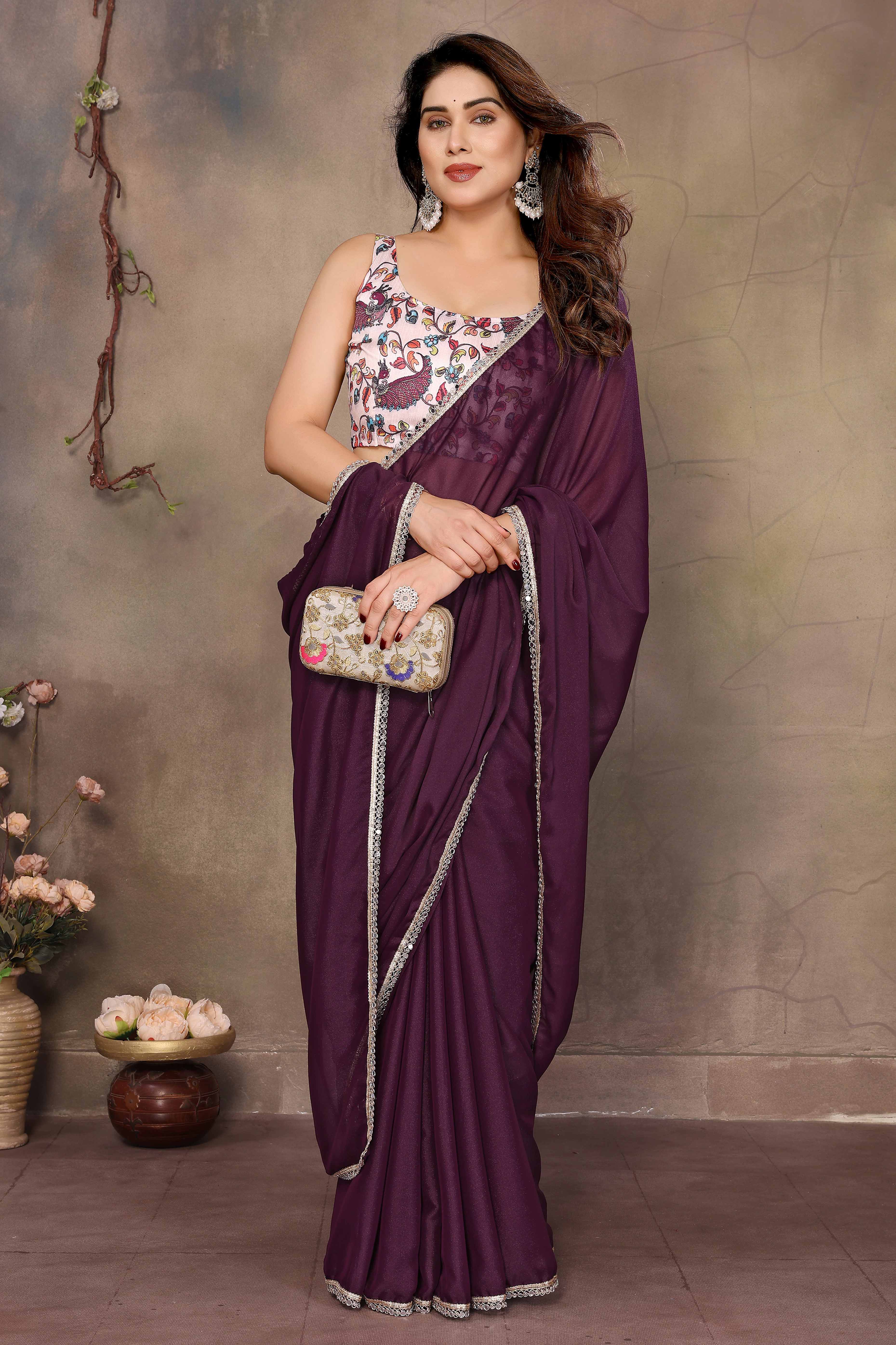 Wine Solid Sparkling Georgette Saree Enhanced With Shimmering Mirror Border