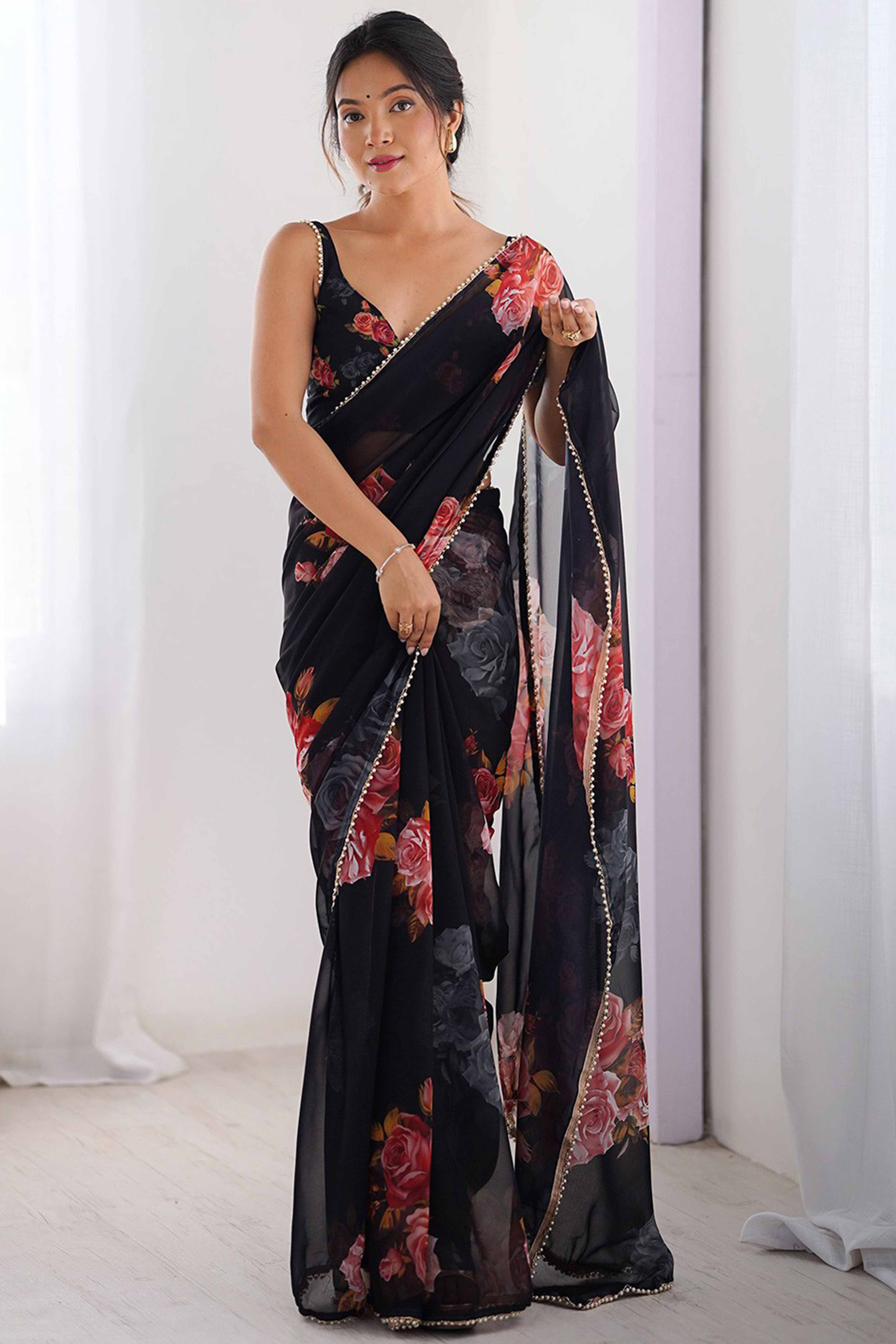 Partywear Black Georgette Saree with Floral Prints and Bead Work Lace