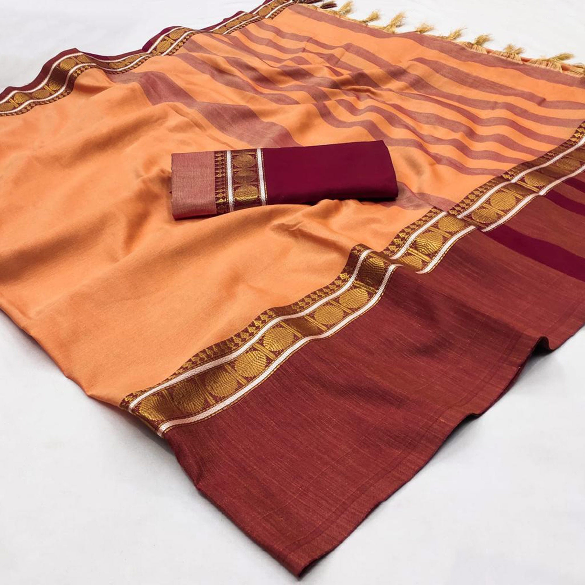 Light Orange Woven Cotton Silk Saree With Tassels