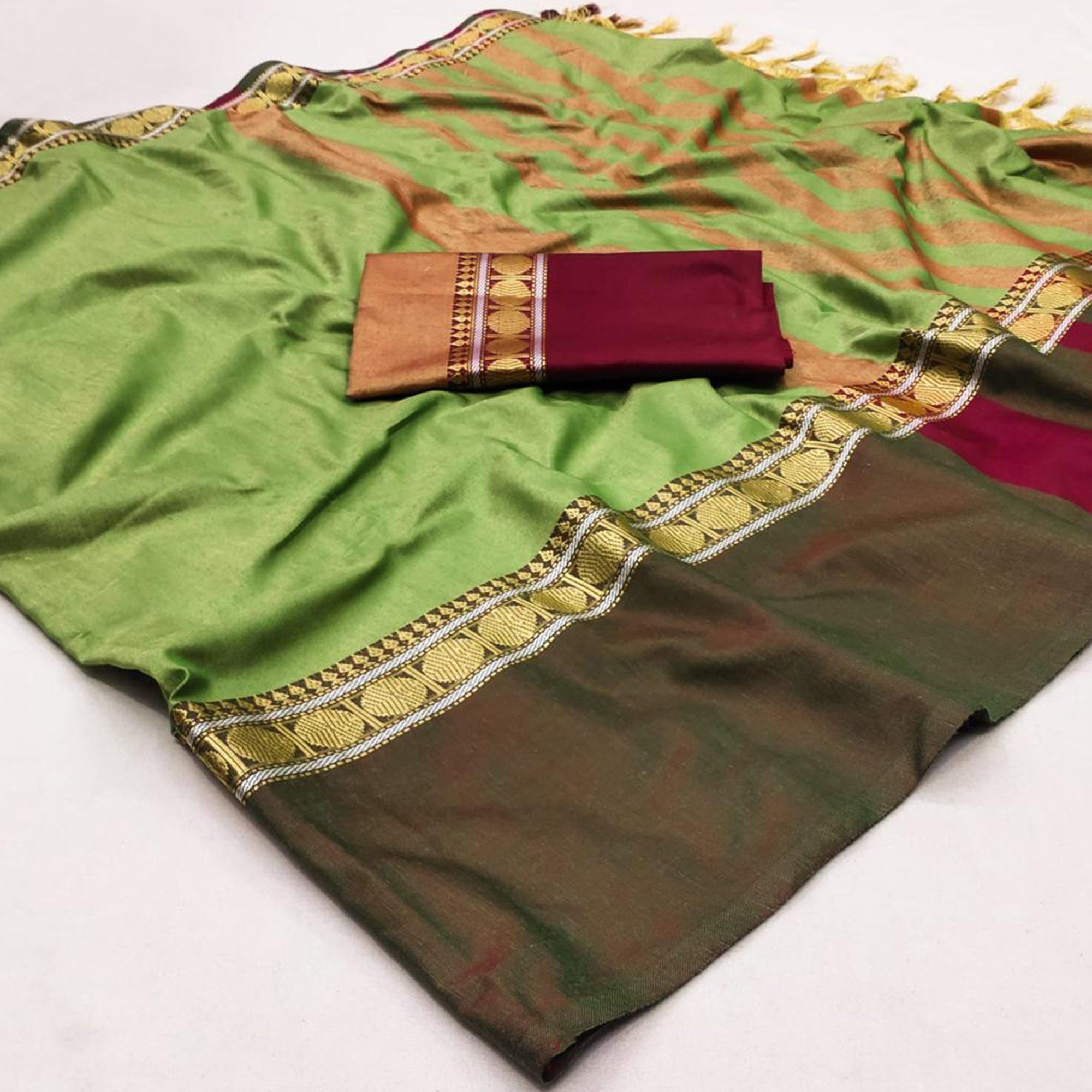 Pastle Green Woven Cotton Silk Saree With Tassels