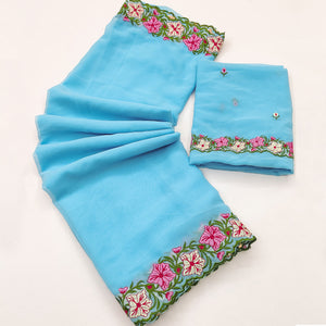 Blue Faux Georgette Saree Featuring Minimalist Floral Border Embroidery