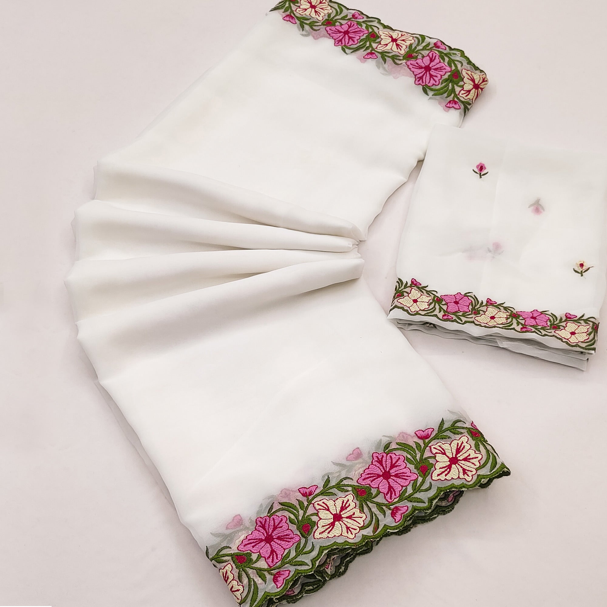 White Faux Georgette Saree Featuring Minimalist Floral Border Embroidery