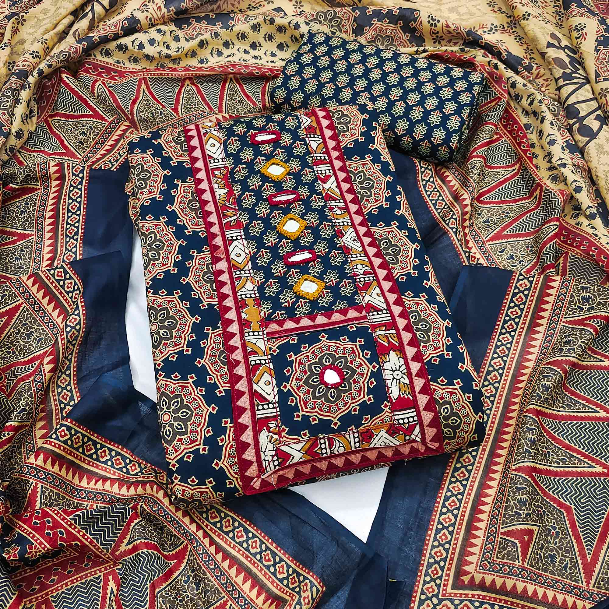 Ethnic Navy Blue Floral Printed Pure Cotton Dress Material Accented With Fine Neck Embroidery Work