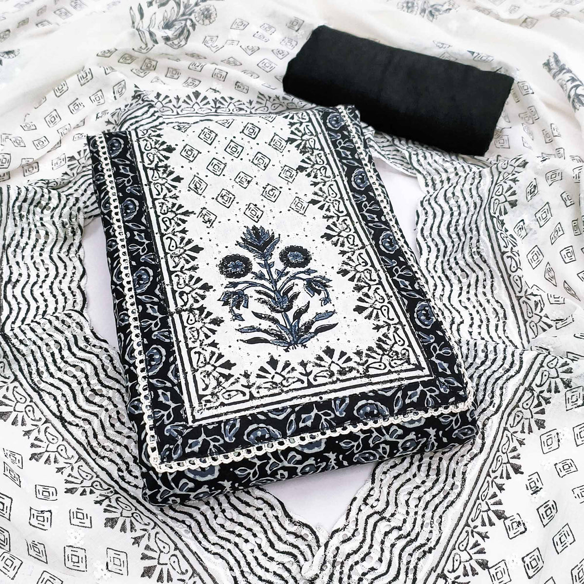 Refined Black Floral Printed Pure Cotton Dress Material With A Clean C