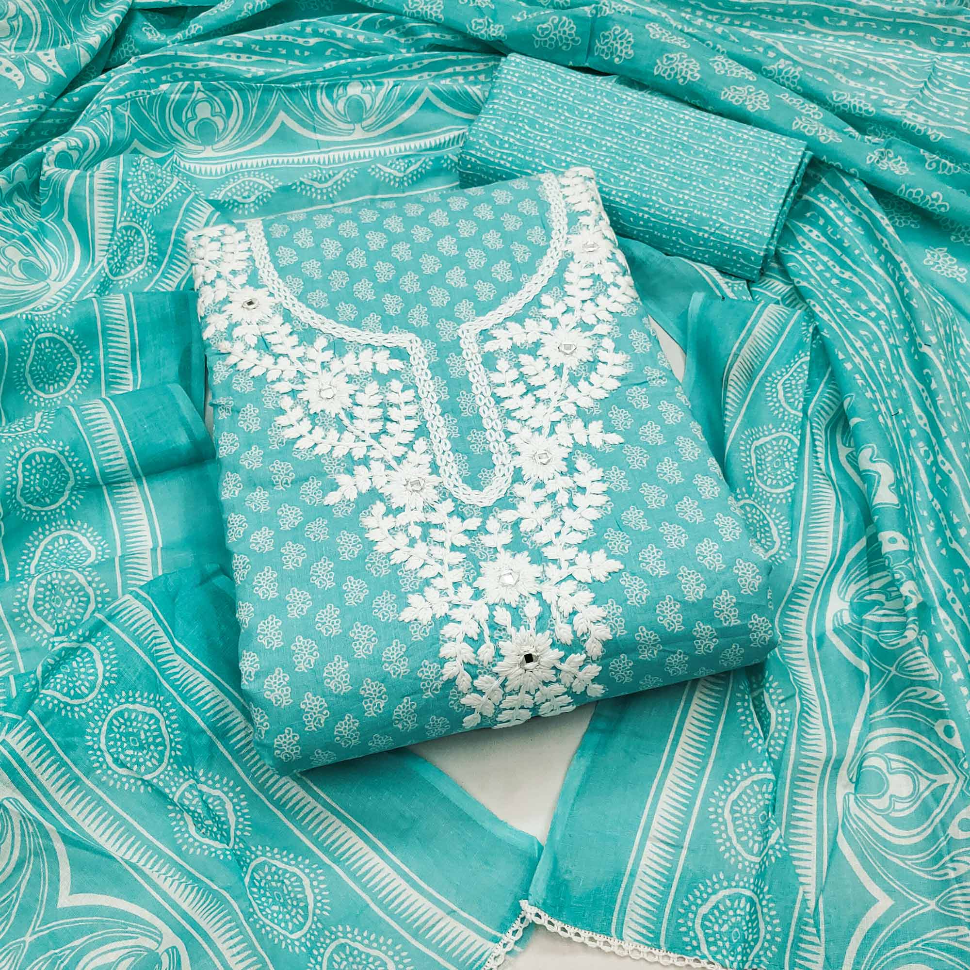 Aqua Green Pure Cotton Dress Material with Artistic Neck Embroidery and Subtle Printed Motifs