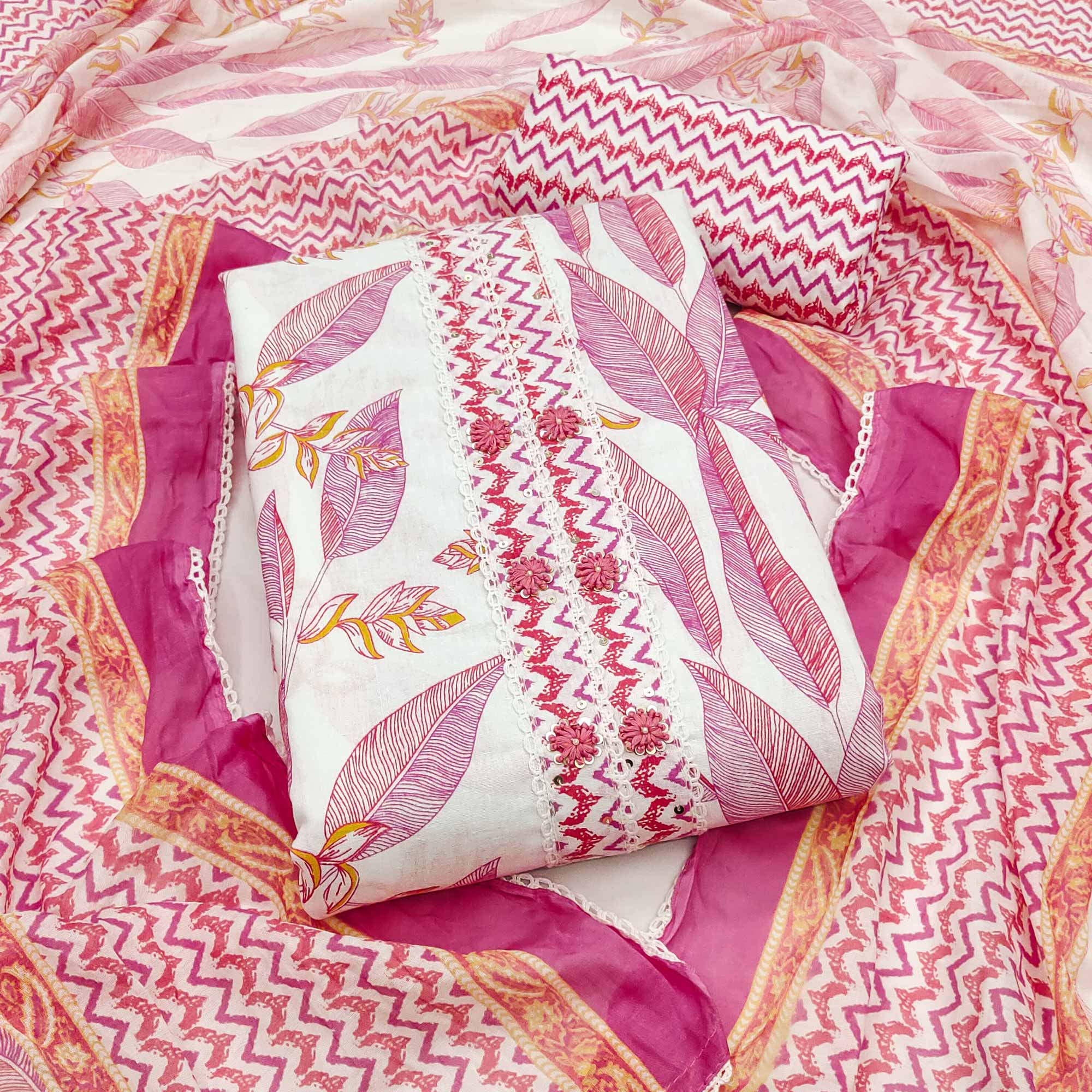 Stylish Pink Floral Pure Cotton Dress Material Accented With Neckline Sequins Embroidery