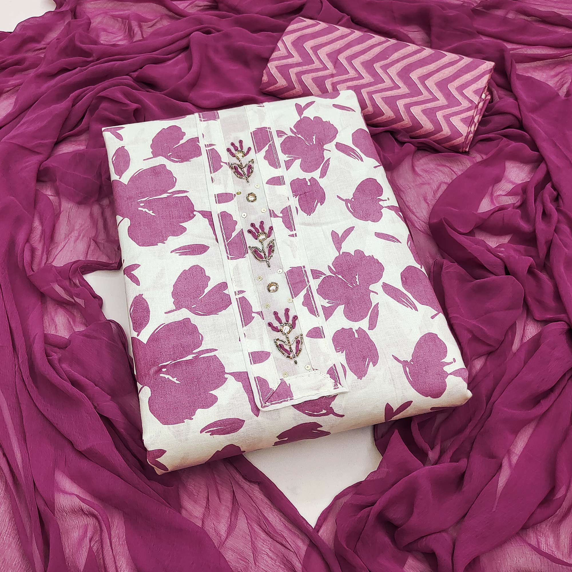White Base Pure Cotton Dress Material Accented with Beautiful Purple Florals