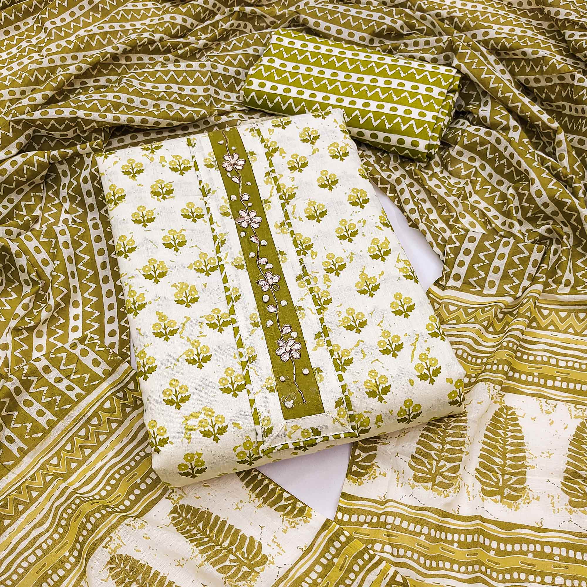 Green Cotton Suit Material Enhanced with Soft Floral Prints
