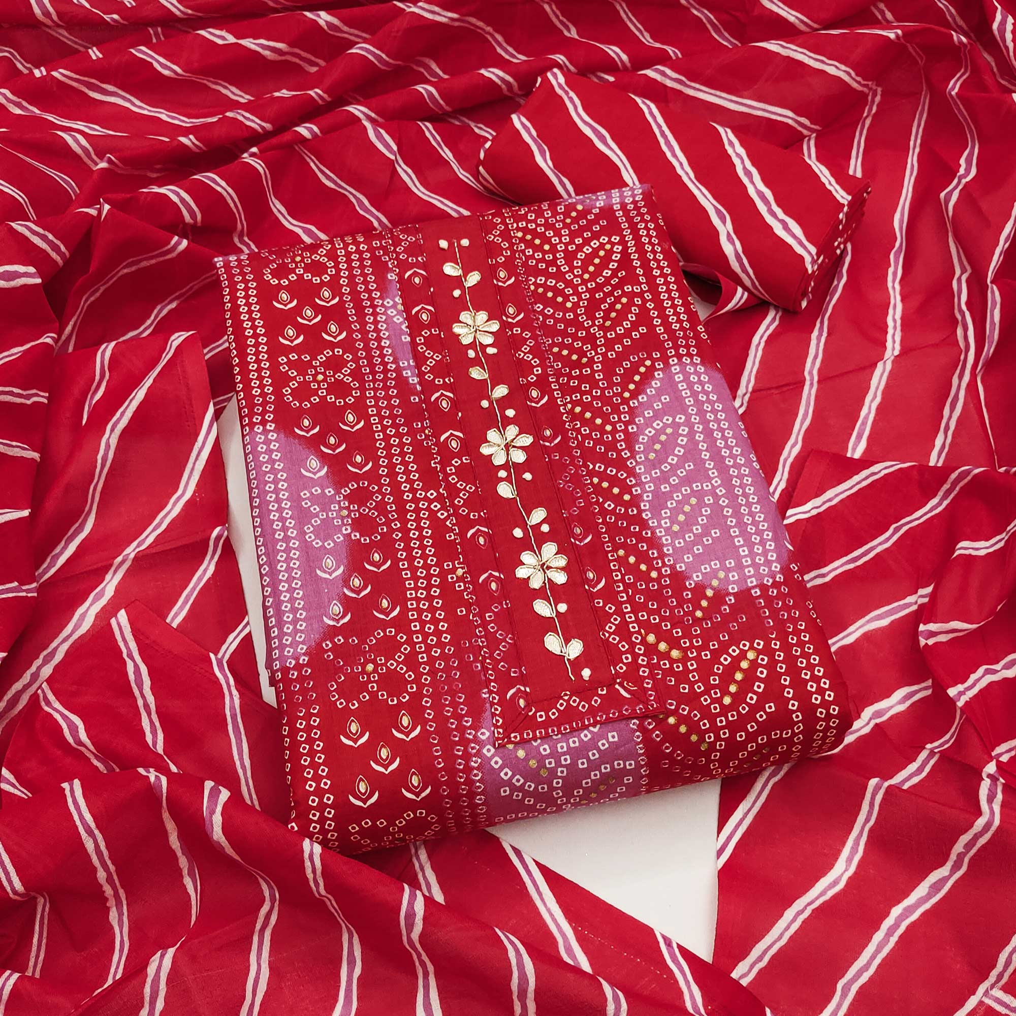 Pink Pure Cotton Dress Material Adorned with Bandhani Print & Artistic Floral Handwork Detailing