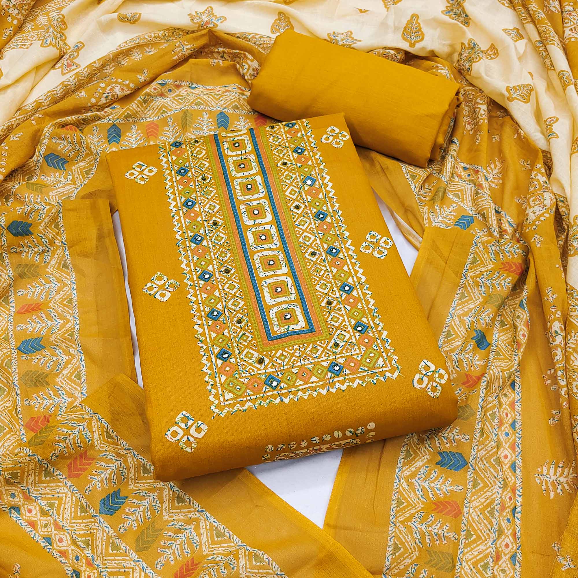 Graceful Mustard Floral Printed Pure Cotton Dress Material With Elegant Neck Embroidery Work