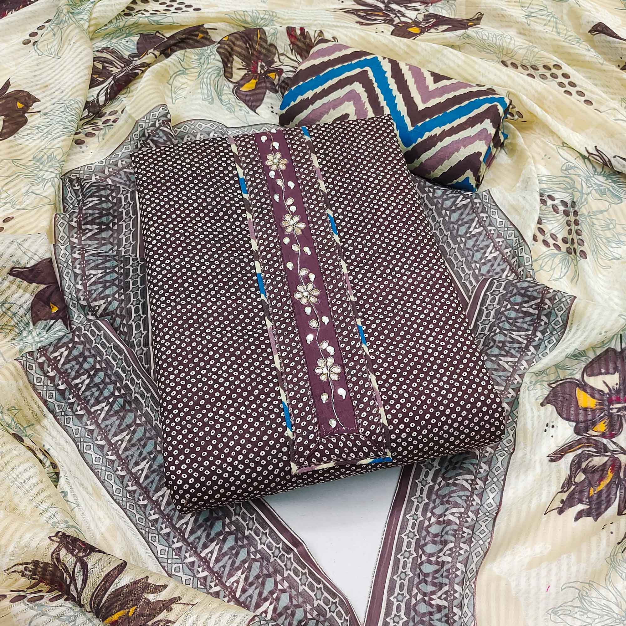 Elegant Wine Bandhani Printed Pure Cotton Dress Material Enhanced With Delicate Floral Handwork