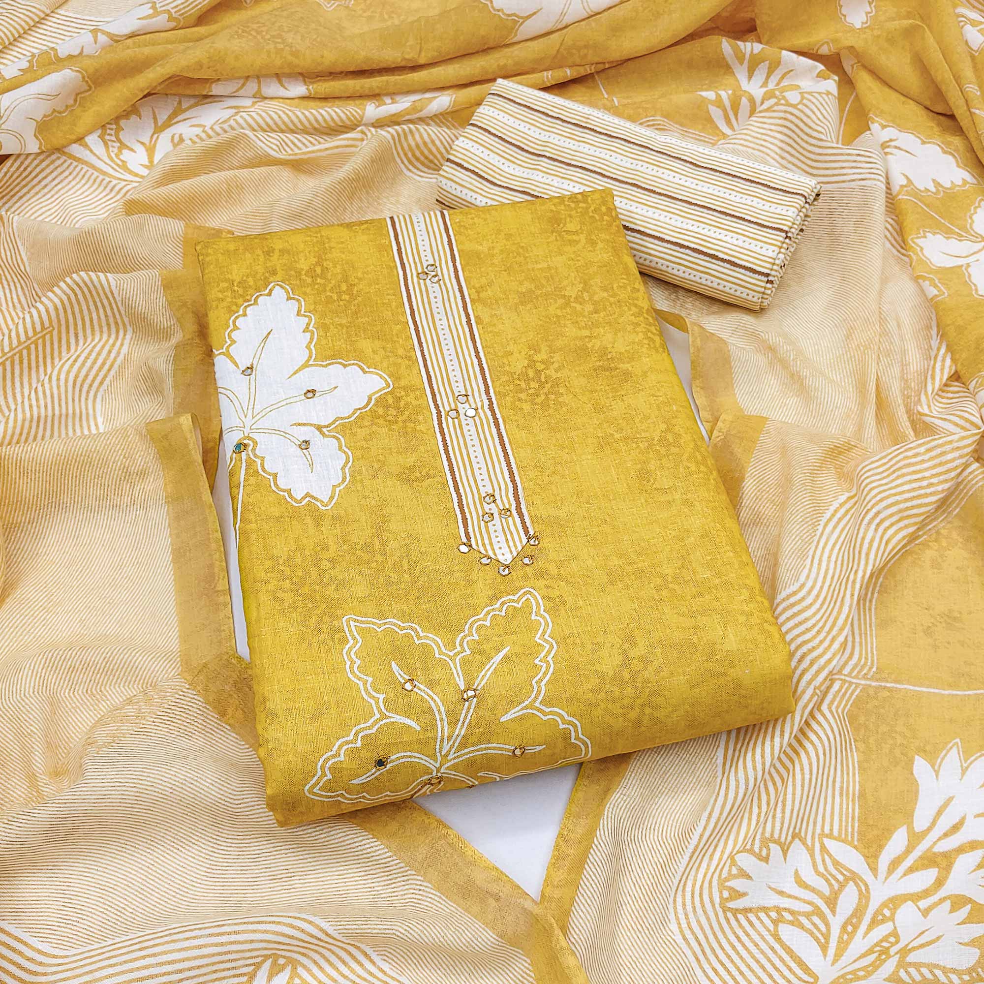Charming Mustard Floral & Leaf Printed Pure Cotton Dress Material Featuring Subtle Embroidery Work